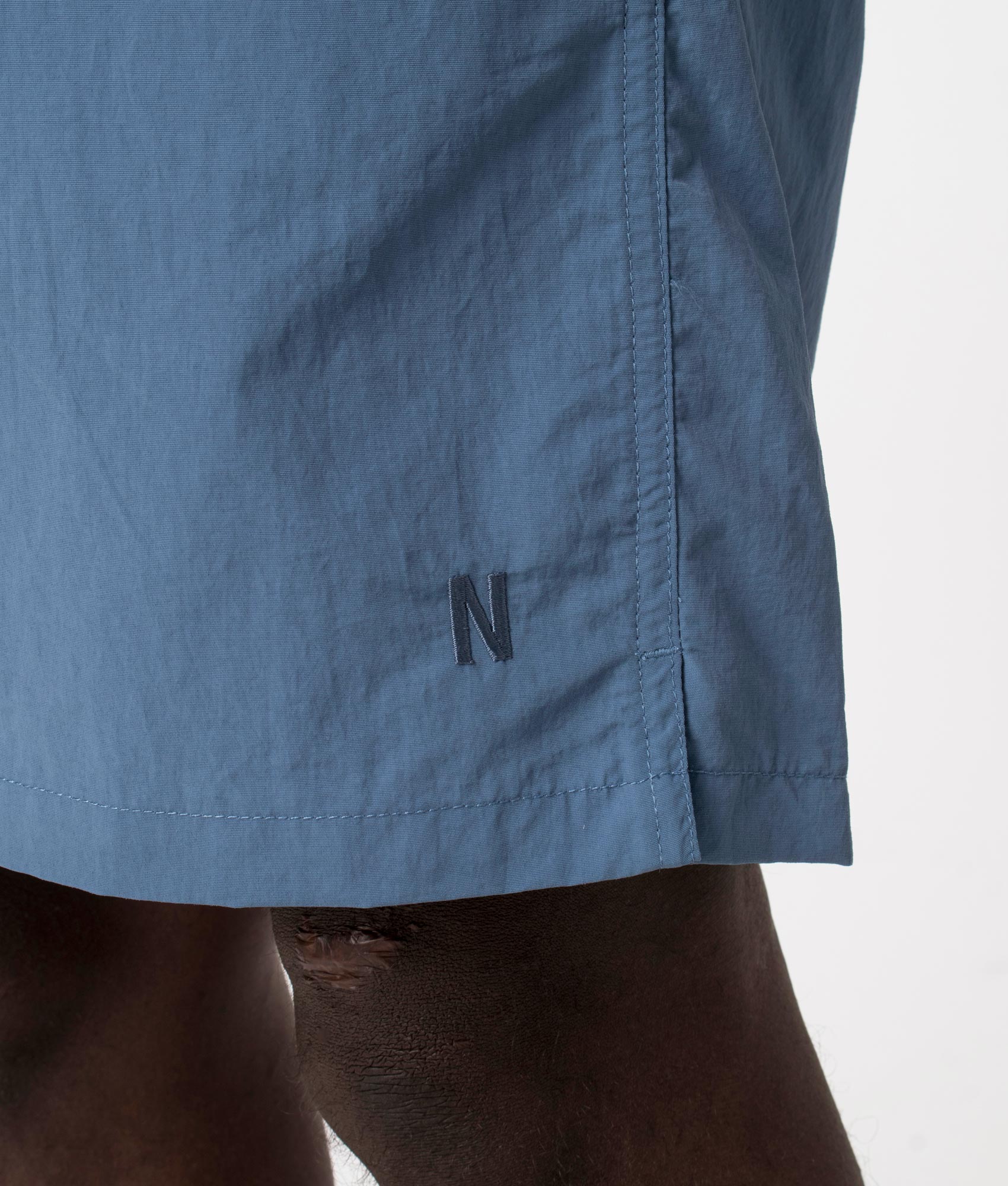 Hauge Recycled Nylon Swimmers in Fog Blue by Norse Projects. EQVVS Detail Shot.