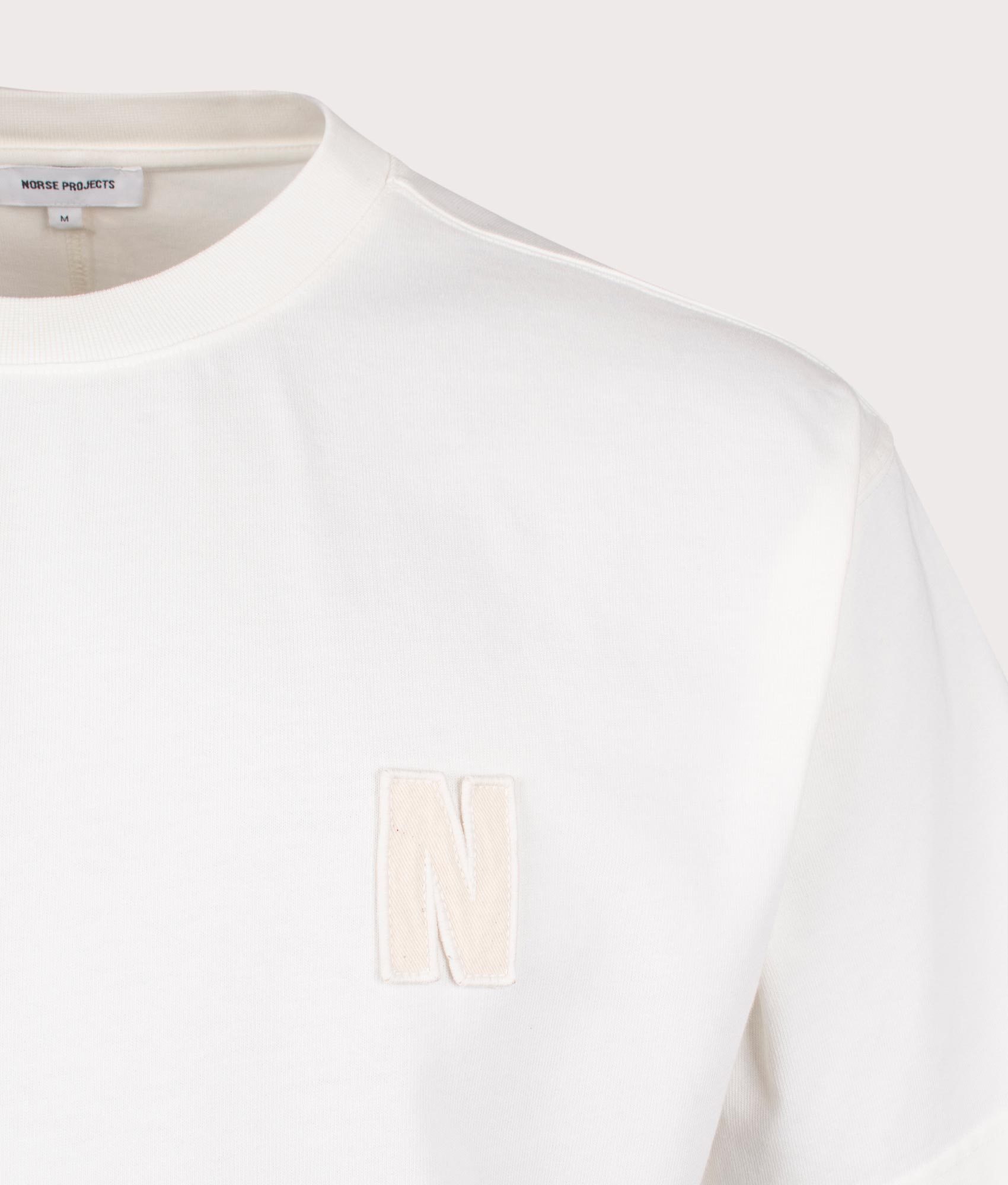 Norse Projects Oversized Simon Heavyweight N Patch T-Shirt in Ecru at EQVVS Menswear Detail Shot