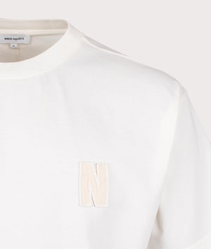 Norse Projects Oversized Simon Heavyweight N Patch T-Shirt in Ecru at EQVVS Menswear Detail Shot