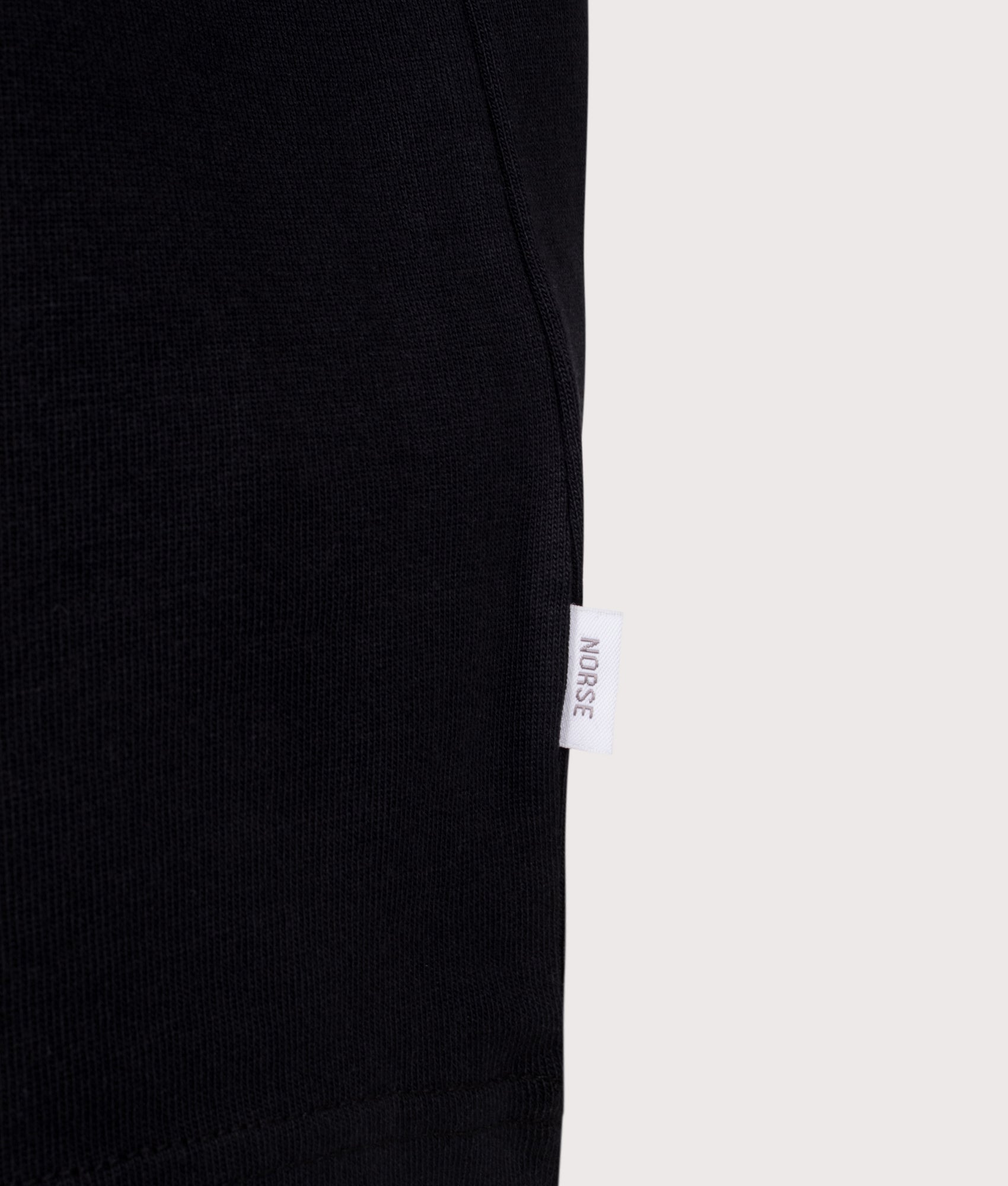 Norse Projects Norse Standard T-Shirt in Black. Shot at EQVVS. Detail shot. 
