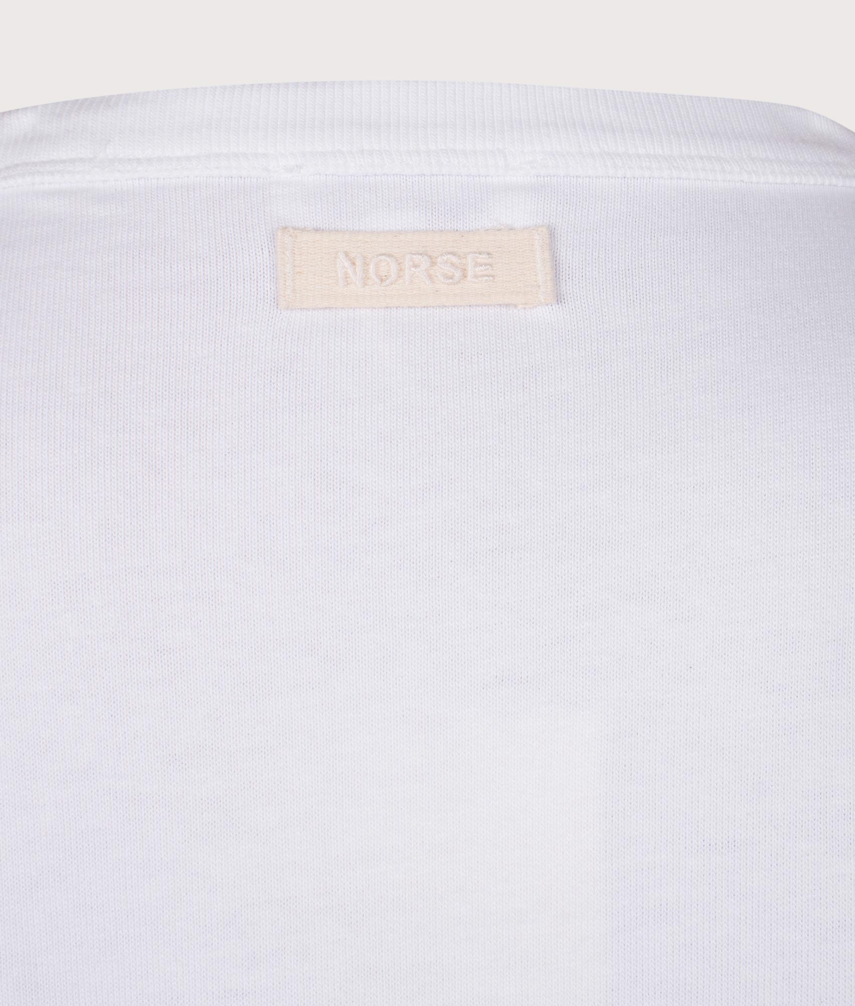 Norse Projects Simon T-Shirt in White. Shot at EQVVS.  Detail shot. 