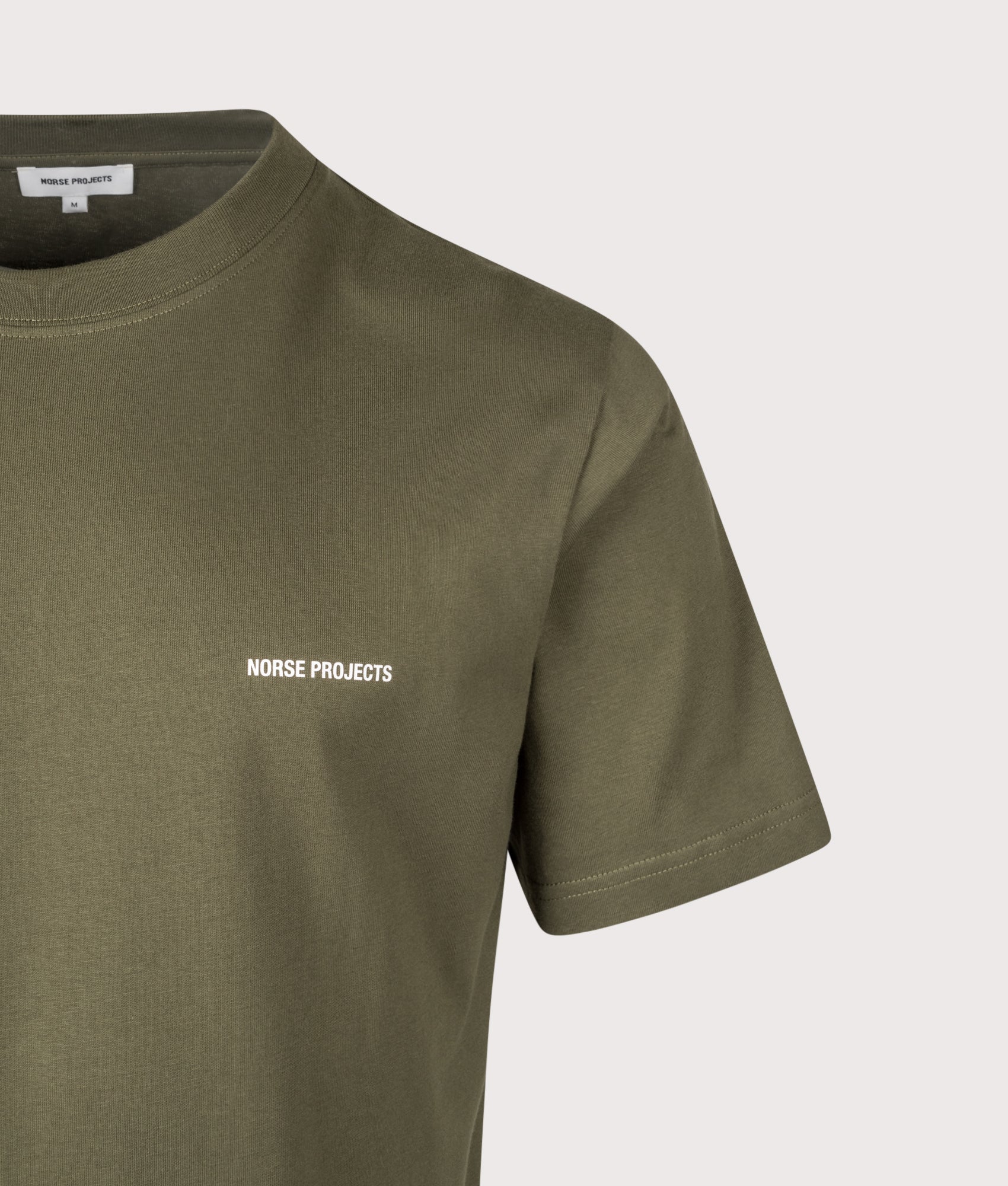 Johannes Organic Norse Logo Print T-shirt by Norse Projects in Olive. Shot by EQVVS. Detail shot.