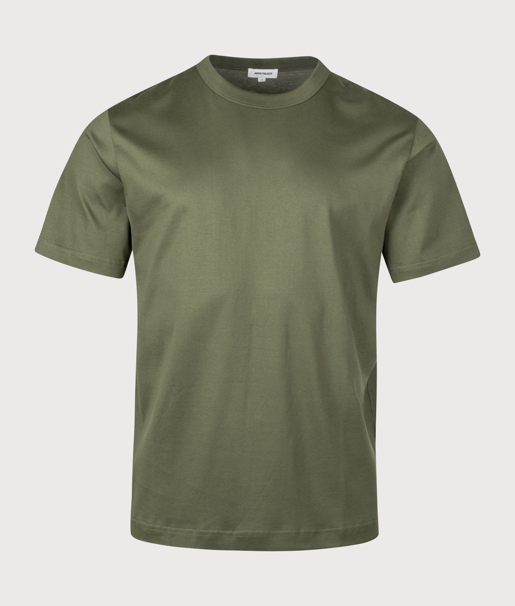 Holger Organic Optic Print T-shirt by Norse Projects in Olive Night. Shot by EQVVS. Front shot.