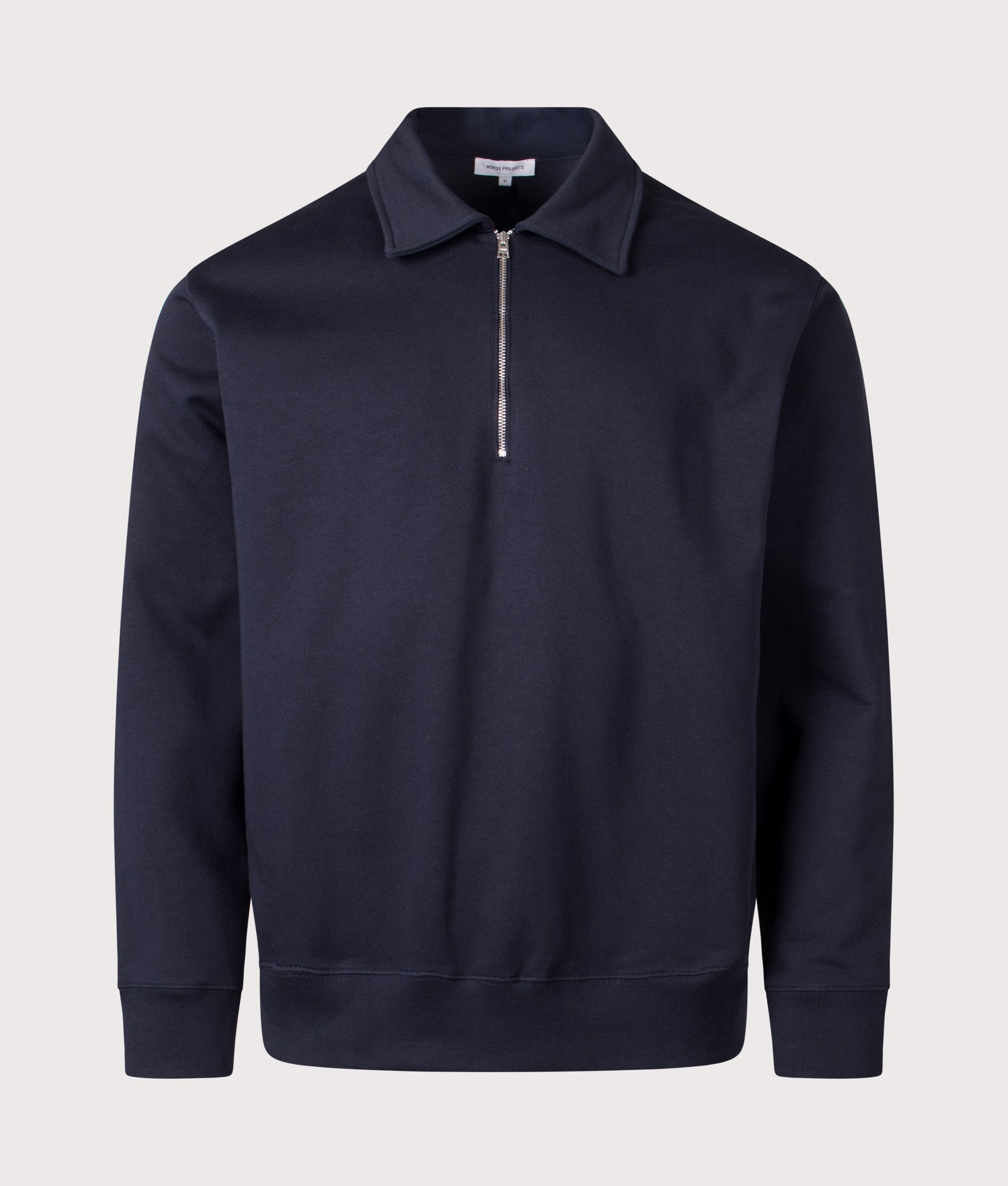 Norse Projects Norse Standard Half Zip Sweatshirt in Dark Navy at EQVVS Menswear. Front shot.