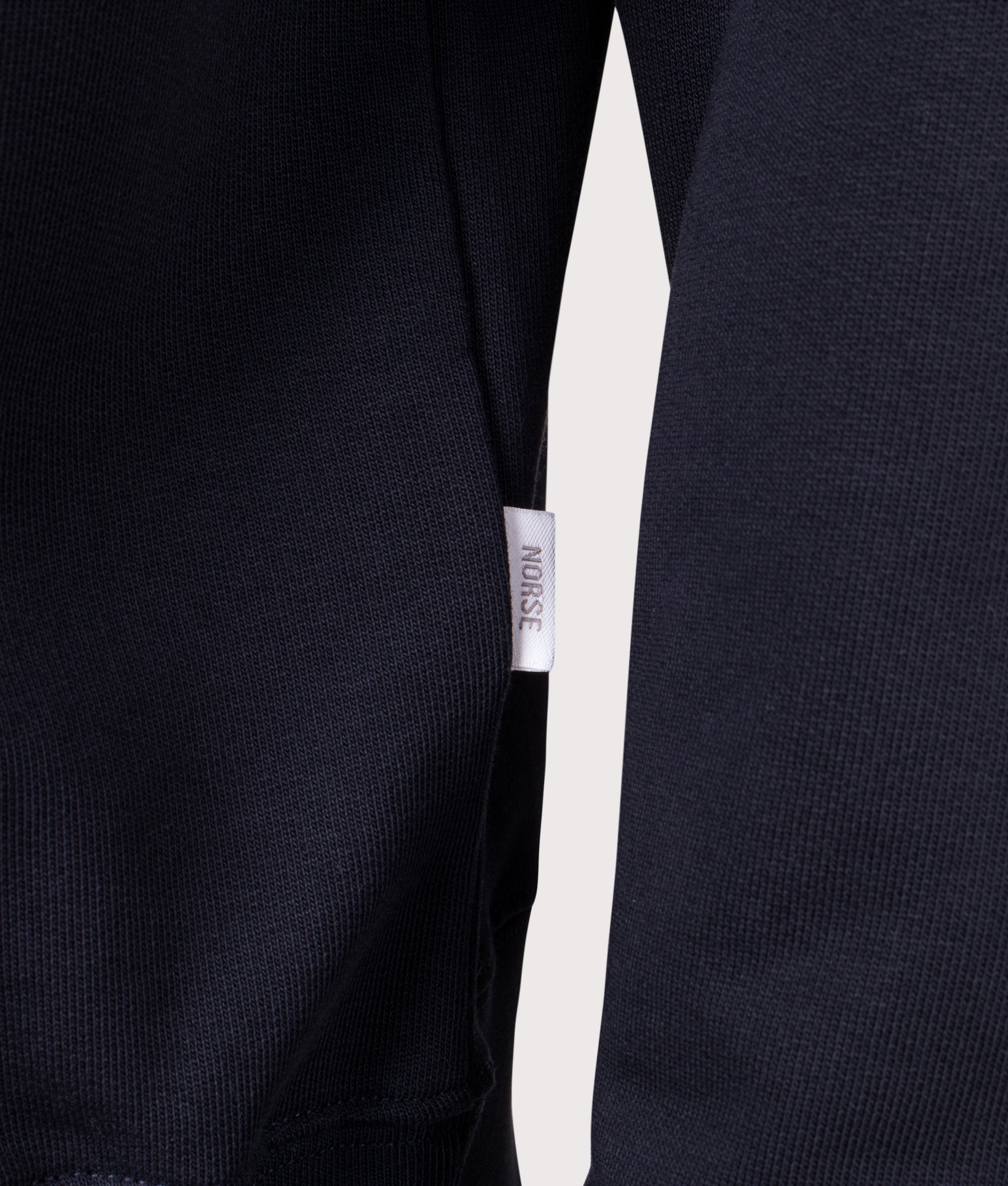 Norse Projects Norse Standard Half Zip Sweatshirt in Dark Navy at EQVVS Menswear. Detail shot.
