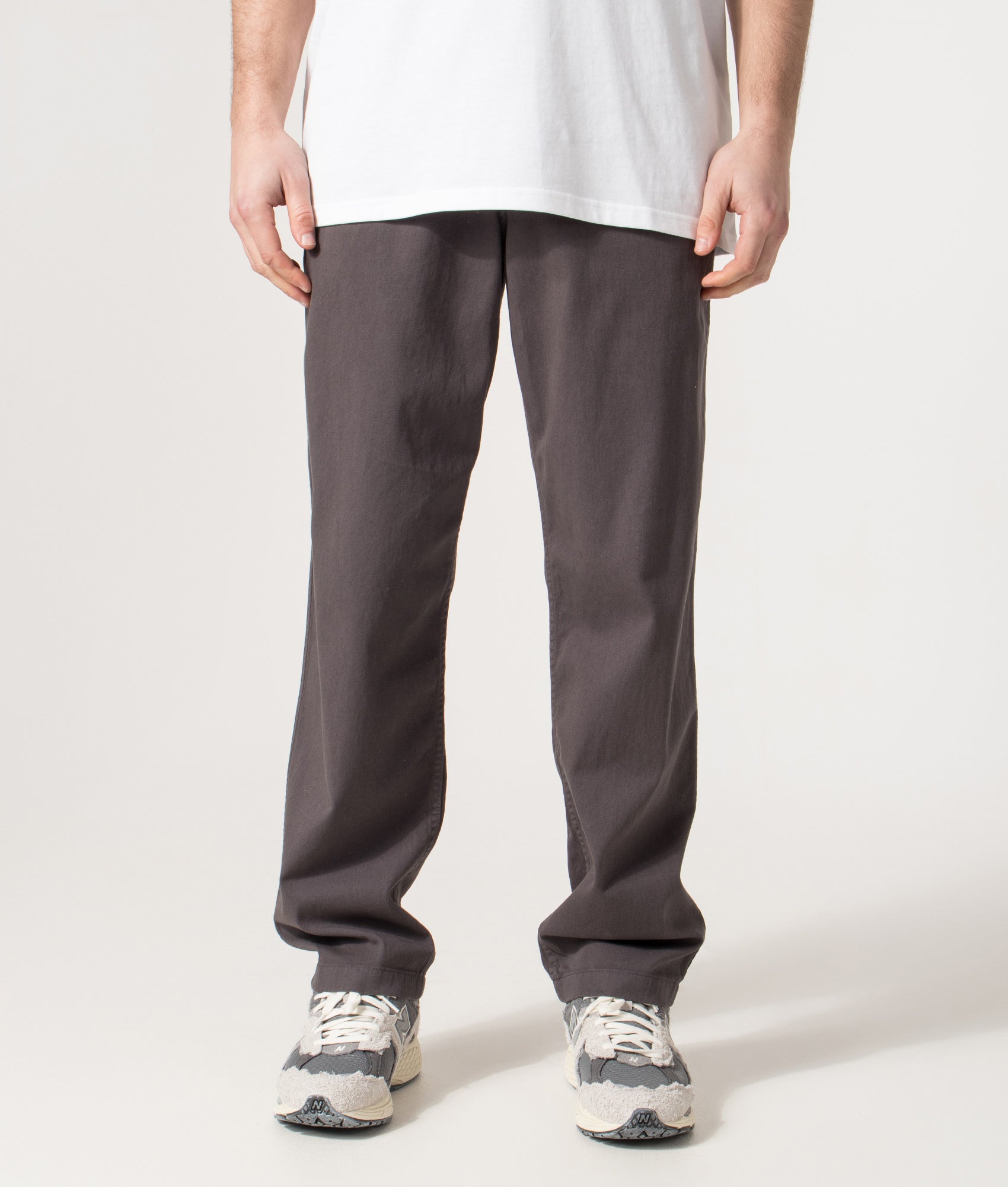 Norse Projects Relaxed Fit Ezra Organic Stretch Twill Trousers in Graphite at EQVVS Menswear. Front shot.