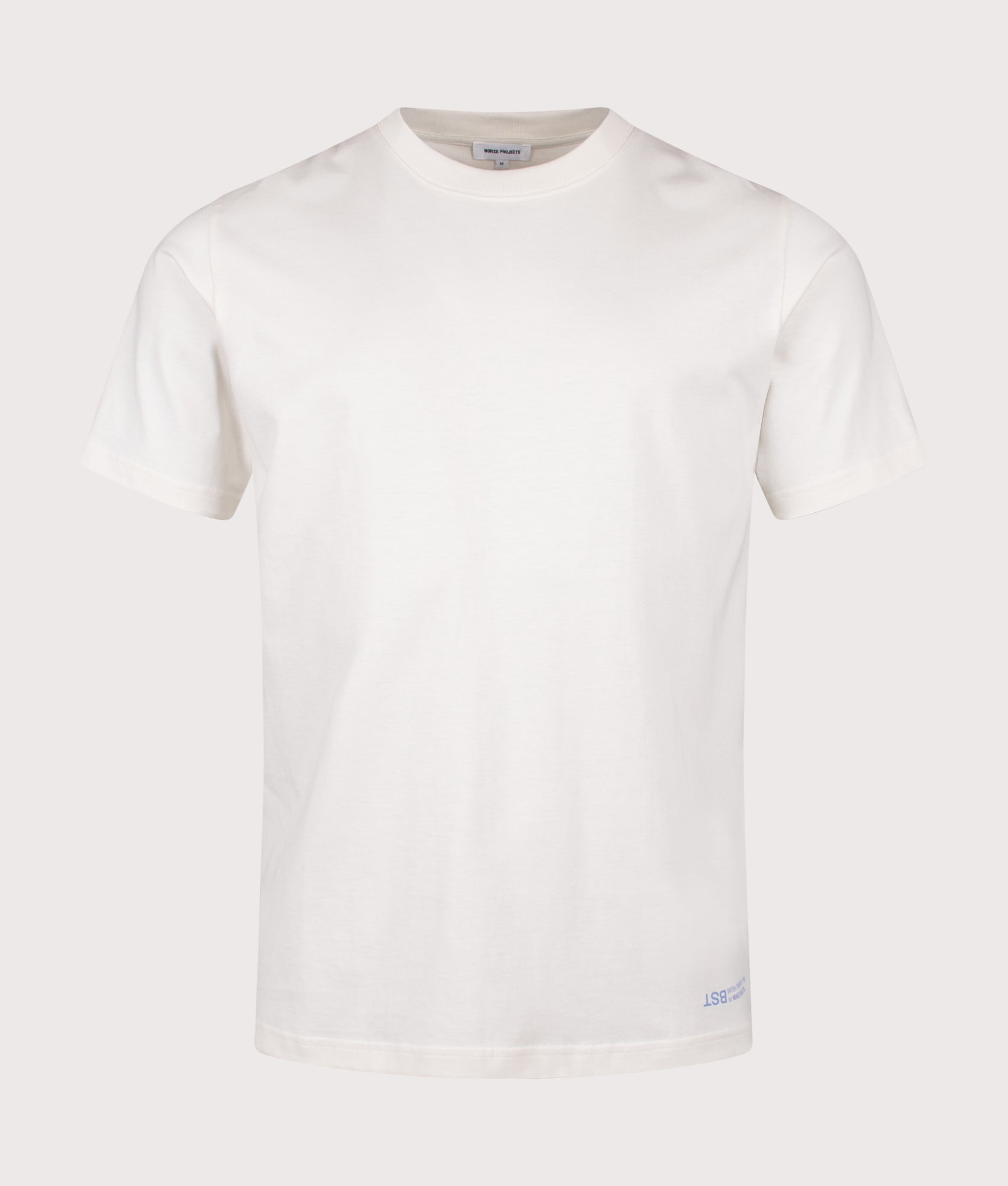 Norse Projects Norse X BST Back Print T-Shirt in Kit White at EQVVS Menswear. Front shot.