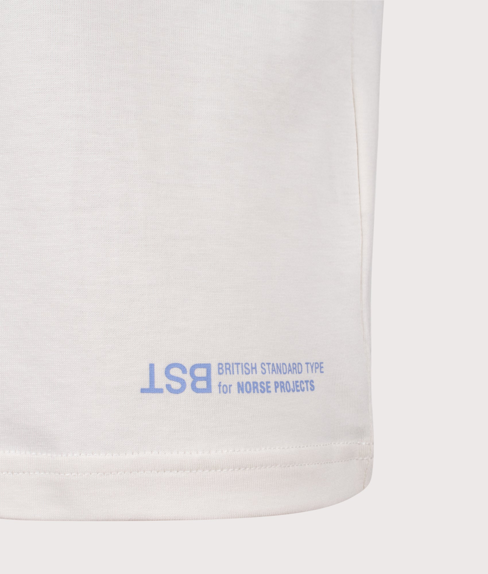 Norse Projects Norse X BST Back Print T-Shirt in Kit White at EQVVS Menswear. Detail shot.