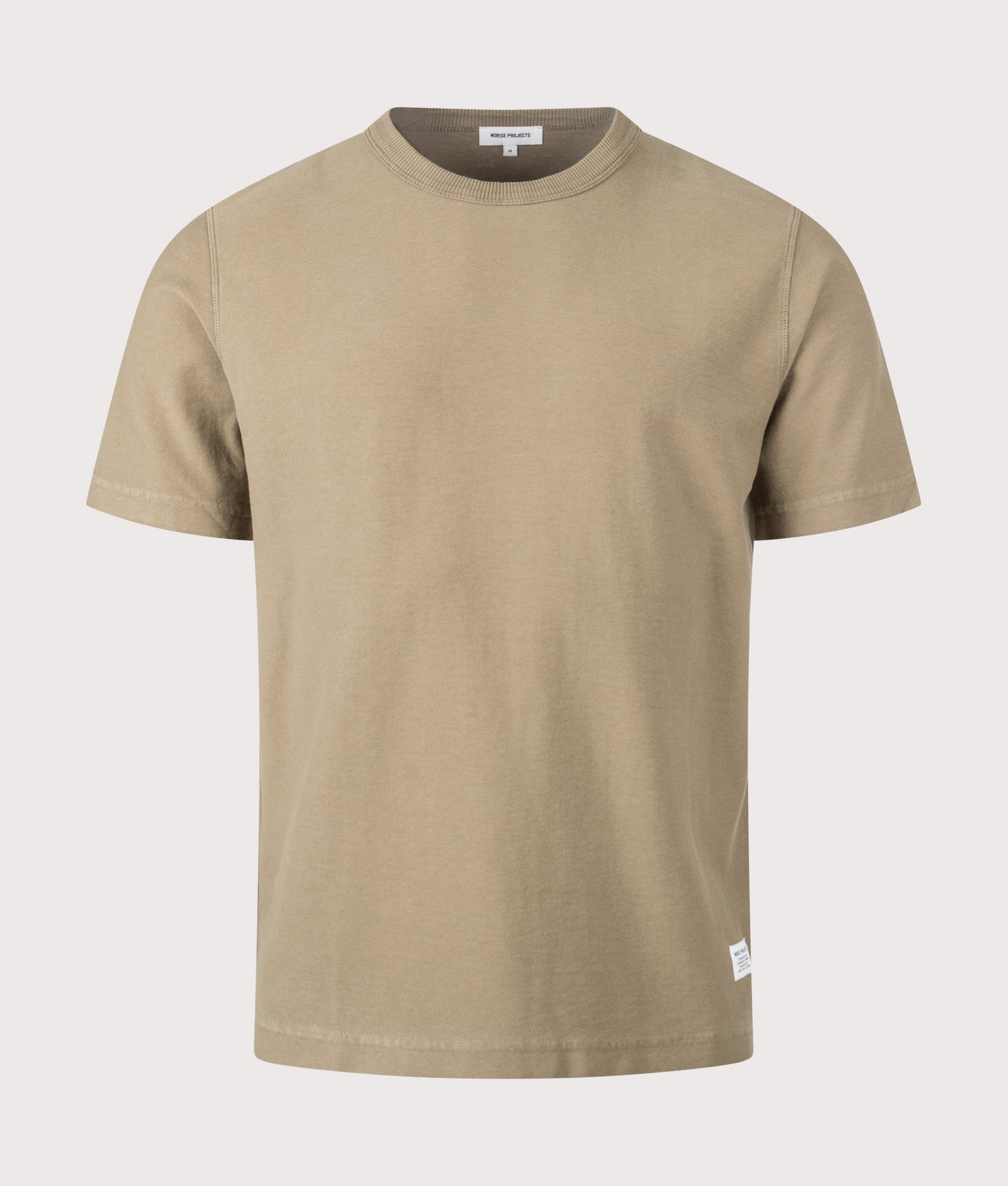 Norse Projects Relaxed Fit Elmelunde Organic Cotton GMD T-Shirt in Walnut at EQVVS Menswear. Front shot.