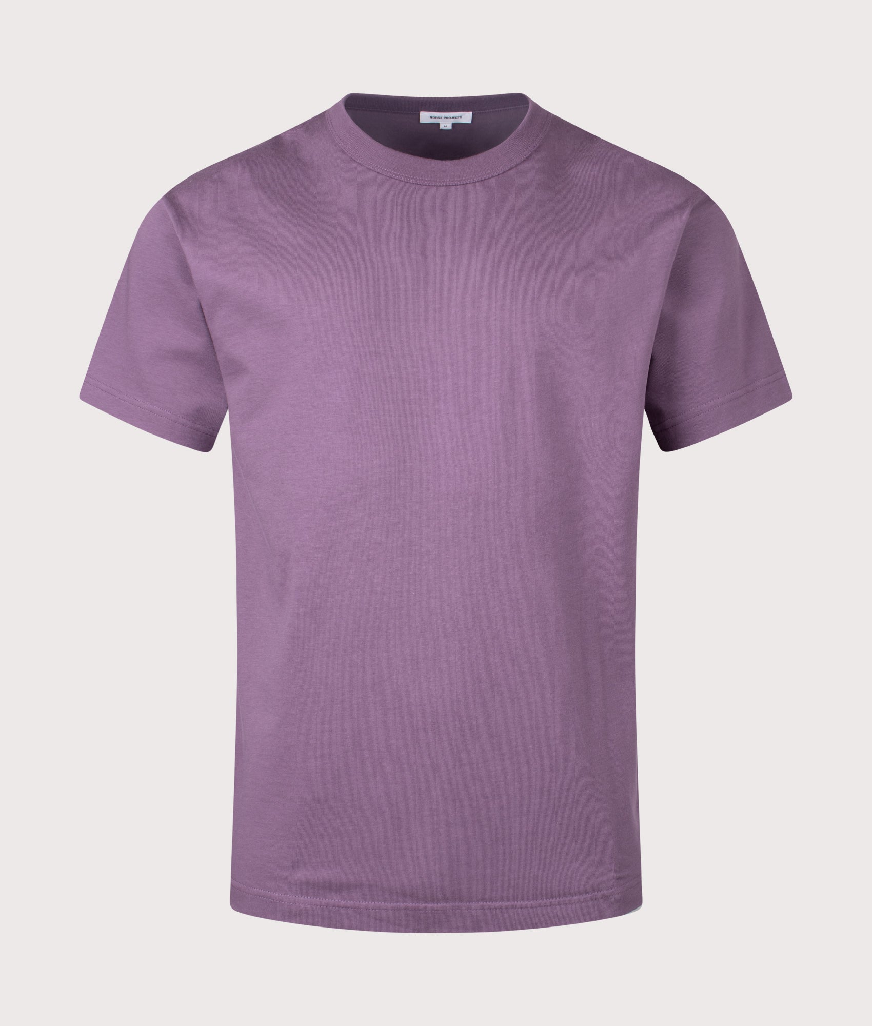 Norse Projects Snekkersten Organic Arch Print T-Shirt in Vintage Violet at EQVVS Menswear. Front shot.
