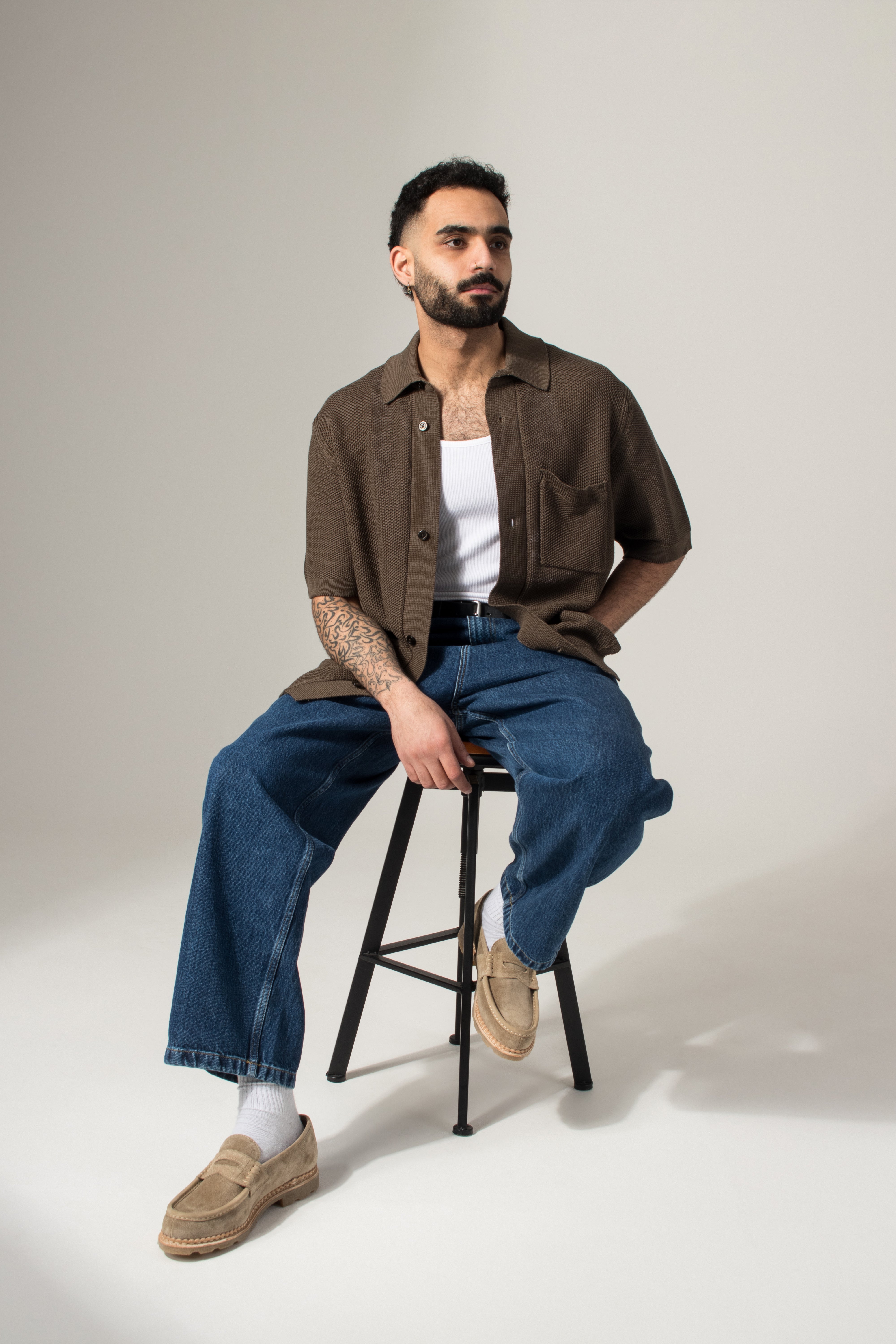 Norse Projects Fredensborg Short Sleeve Knitted Shirt in Turkisk Coffee at EQVVS Menswear. Model shot.