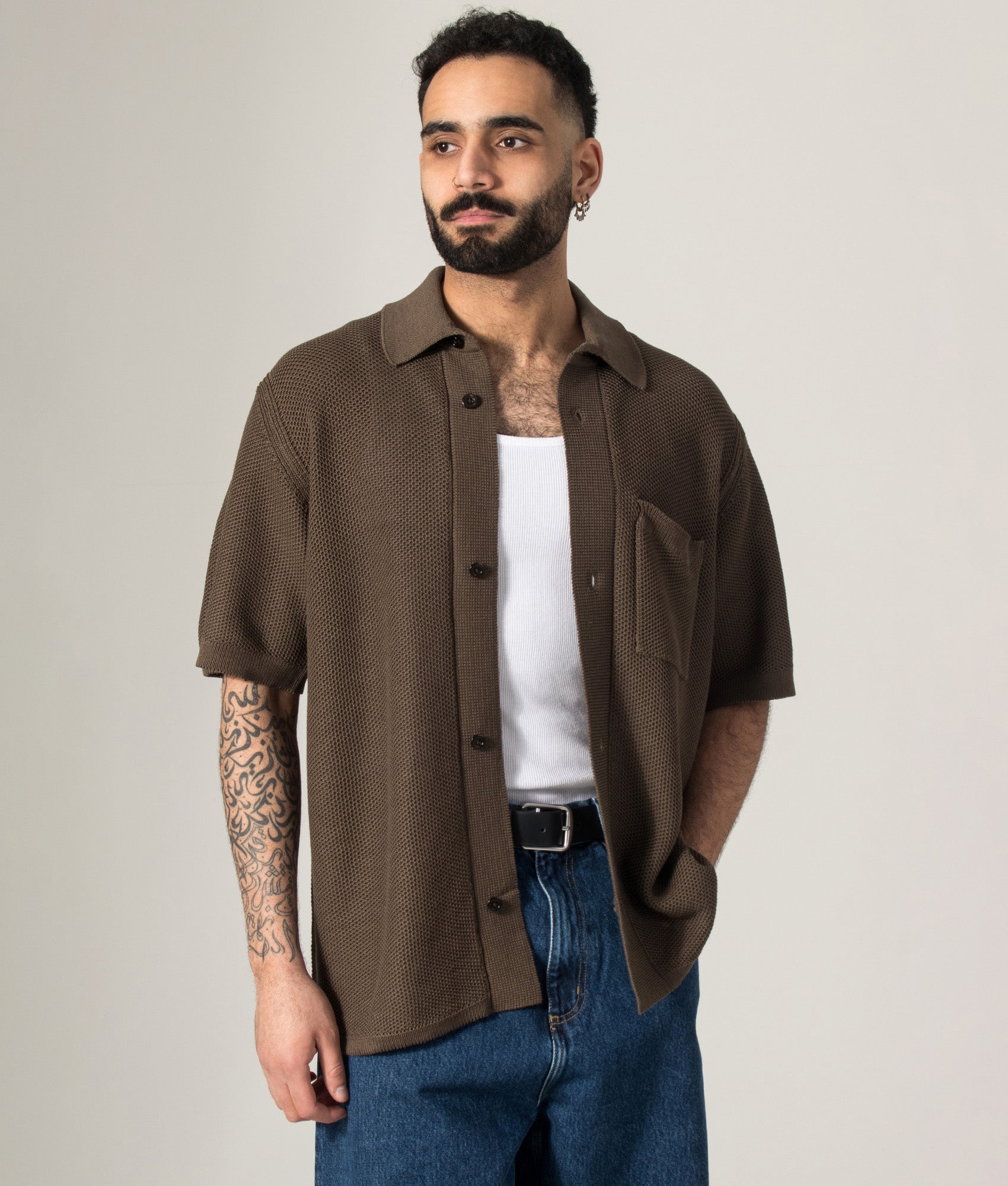 Norse Projects Fredensborg Short Sleeve Knitted Shirt in Turkisk Coffee at EQVVS Menswear. Model front shot.