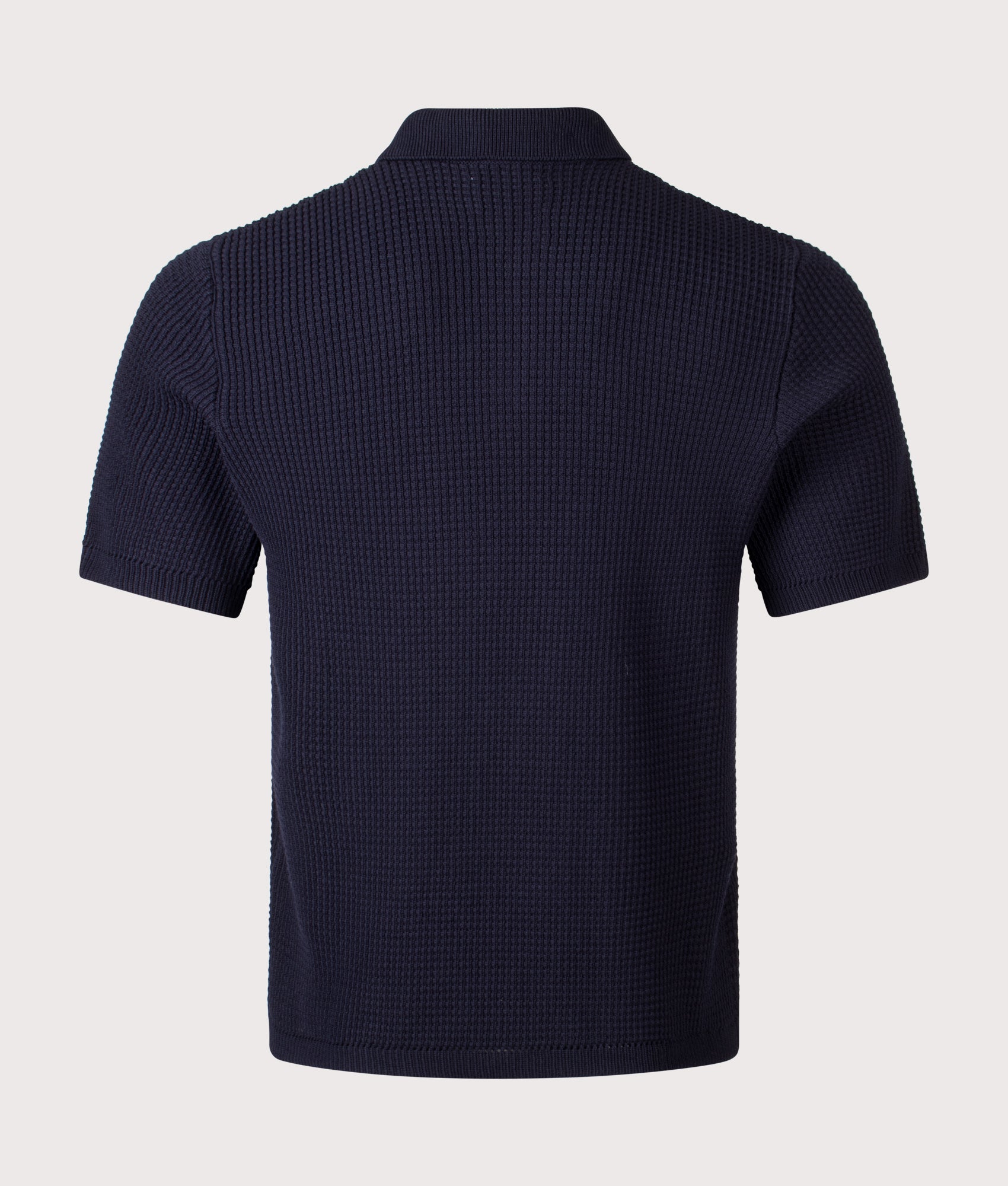 Norse Projects Anholt Cotton Crepe Polo Shirt in Dark Navy at EQVVS Menswear. Back shot.