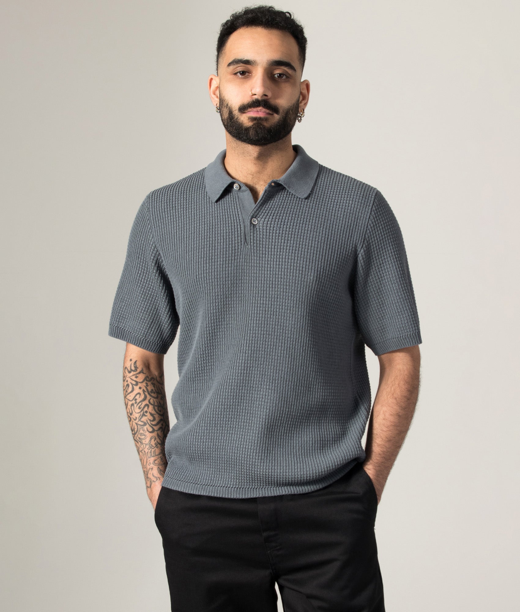 Norse Projects Anholt Cotton Crepe Polo Shirt in Greyish Blue at EQVVS Menswear. Model front shot.