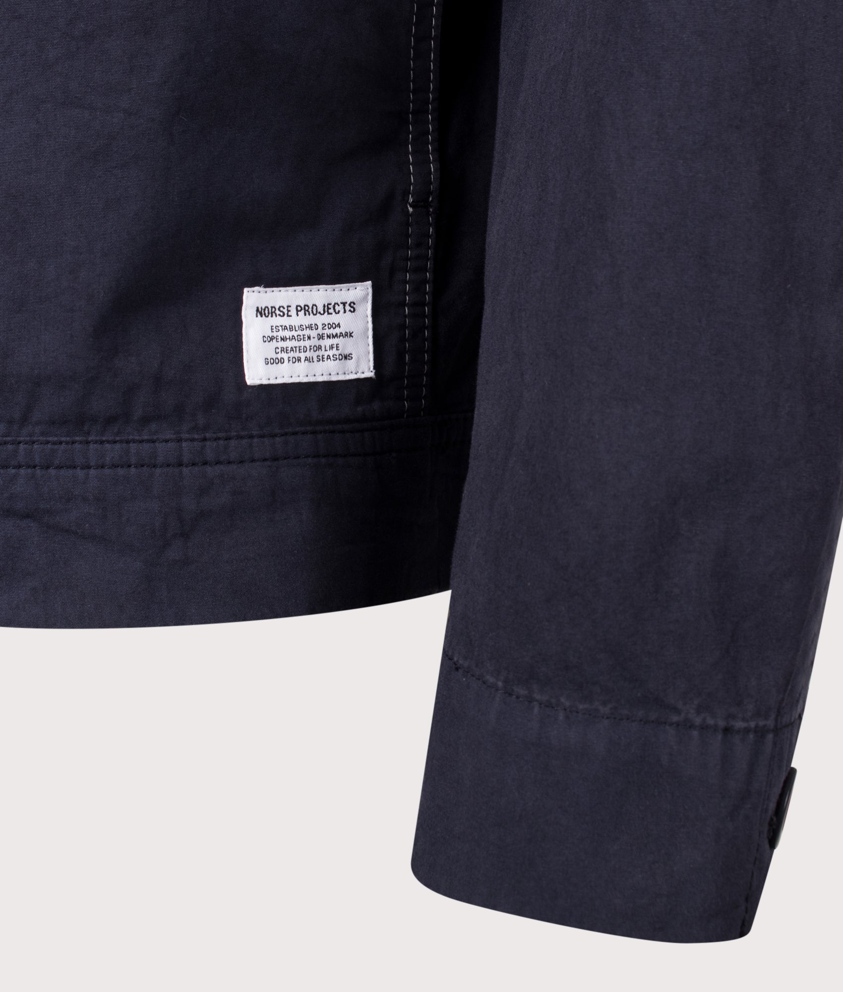 Norse Projects Relaxed Fit Arresskov Compact Cotton Overshirt in Dark Navy at EQVVS Menswear. Detail shot.