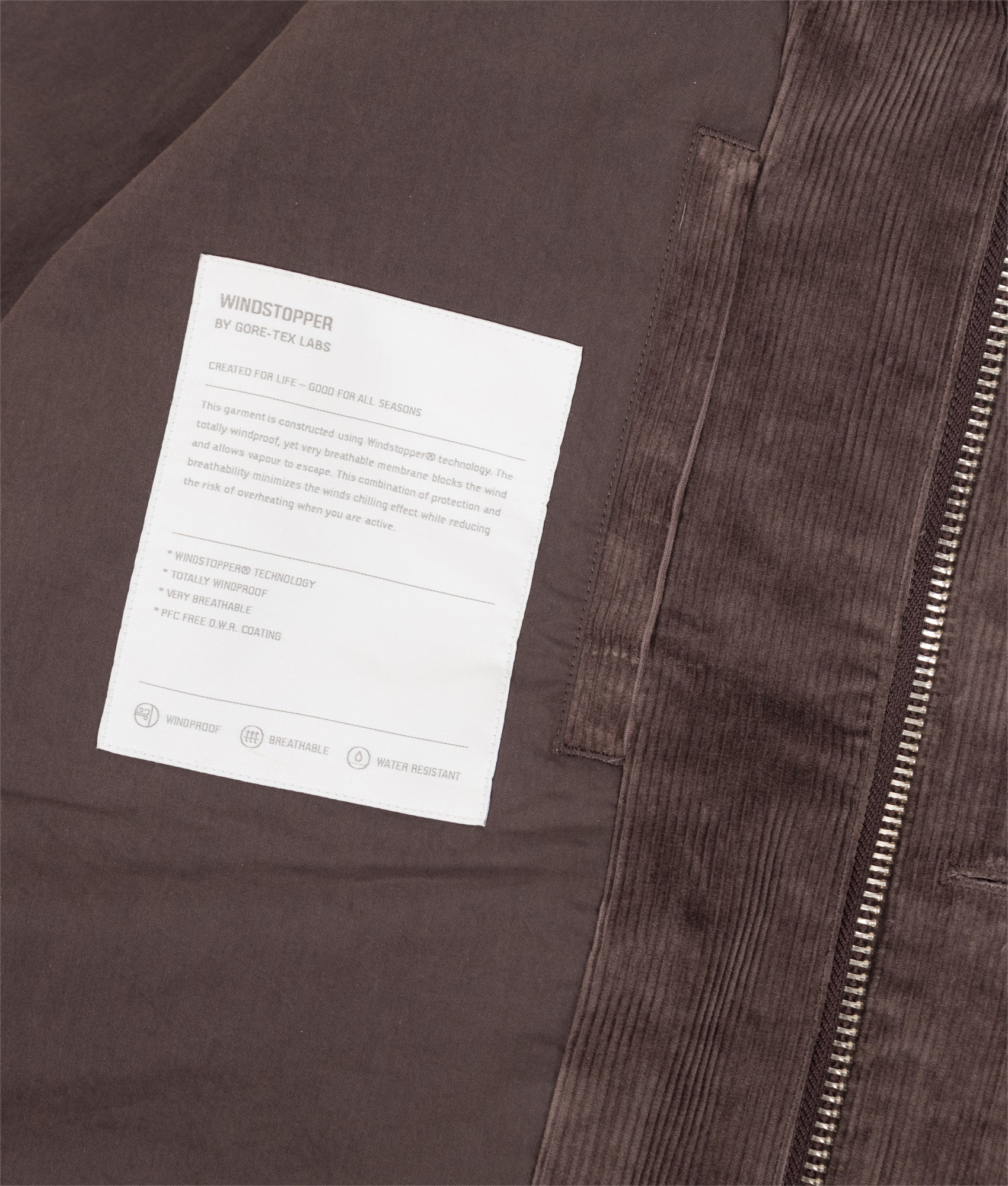 Norse Projects Gribskov Windstopper Jacket in Shale at EQVVS Menswear. GORE-TEX Label shot.