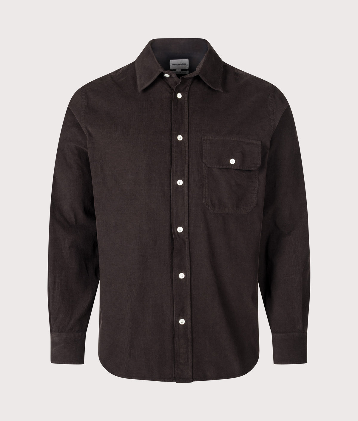 Norse Projects Relaxed Fit Kongshoved Micro Cord Shirt in Espresso at EQVVS Menswear. Front shot.