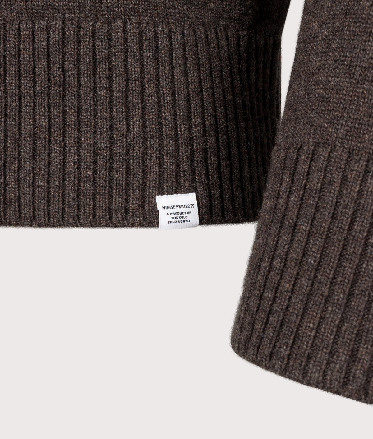 Norse Projects, the Stensmark Merino Lambswool Knit Jumper in Heathland Brown at EQVVS Menswear. Detail shot.