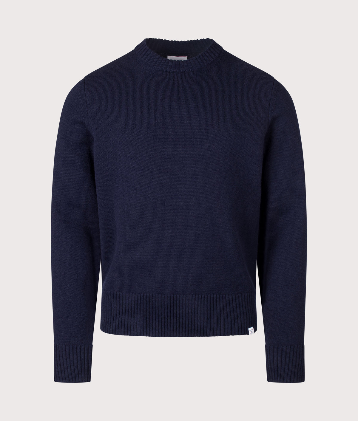 Norse Projects Stensmark Merino Lambswool Knit Jumper in Dark Navy at EQVVS Menswear. Front shot.