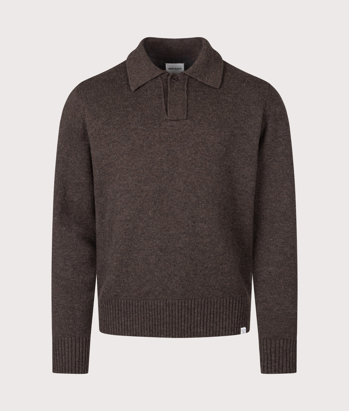 Norse Projects Relaxed Fit Ristinge Long Sleeve Merino Knitted Polo Shirt in the Heathland Brown at EQVVS Menswear. Front shot.