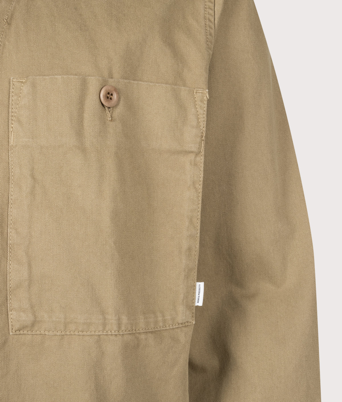 Norse Projects Relaxed Fit Arresskov Broken Twill Overshirt in Lead Grey at EQVVS Menswear. Detail shot.