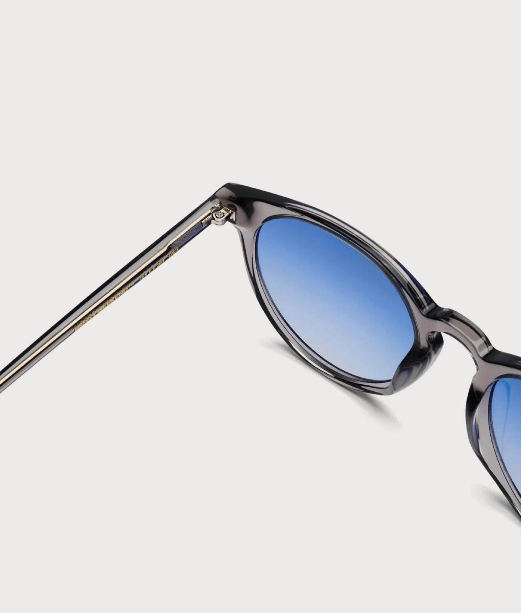 MESSYWEEKEND New Depp Sunglasses in Transparent Grey with Gradient Blue Lens at EQVVS. Detail Shot.