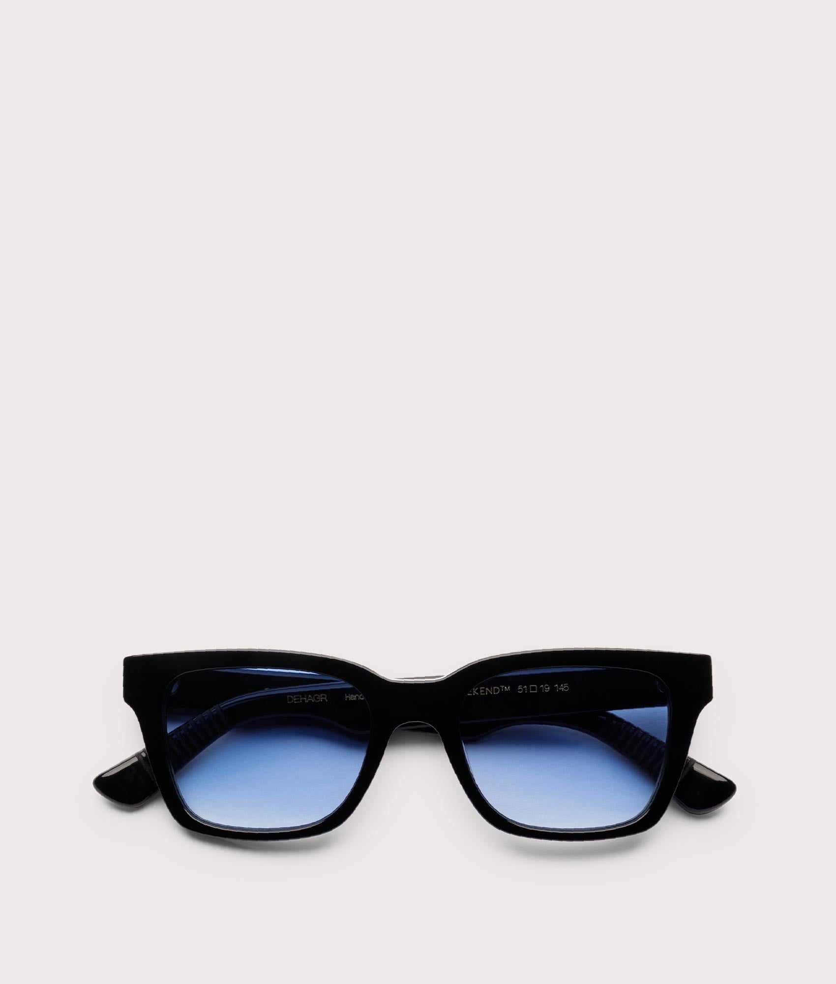 MESSYWEEKEND Dean sunglasses in Black - Gradient Blue Lens at EQVVS Menswear. Folded shot.