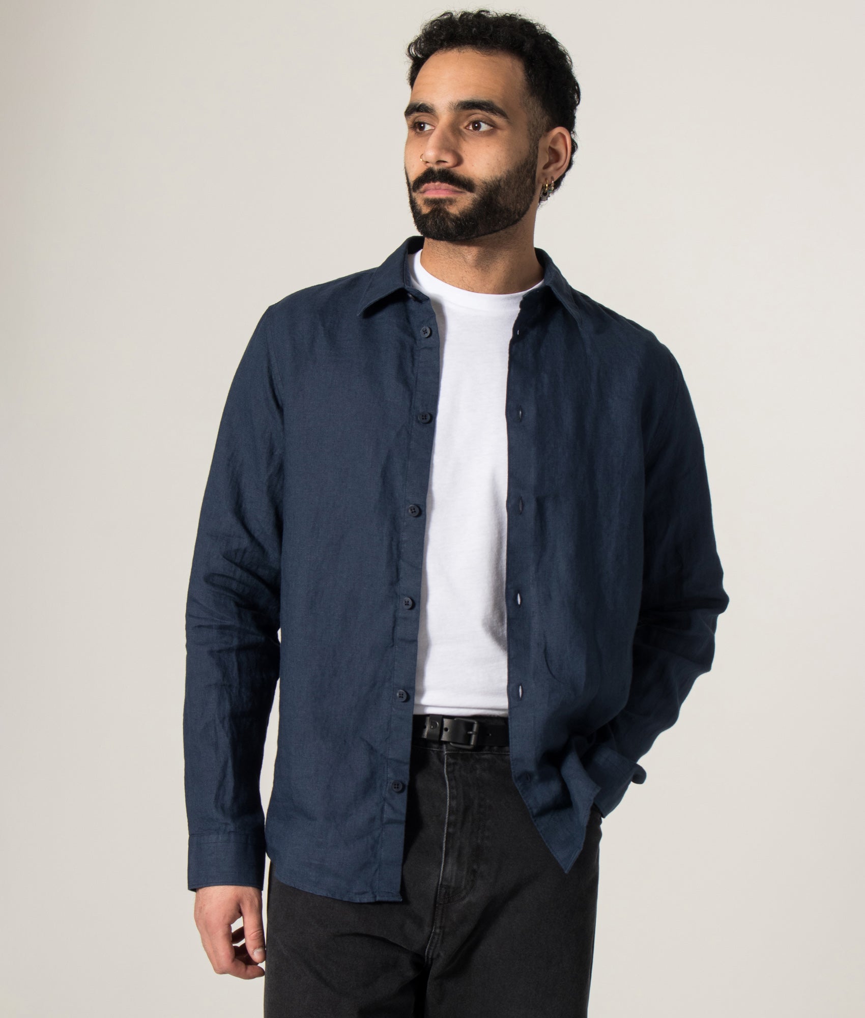 NN.07 Enzo Linen Shirt in Navy Blue at EQVVS Menswear. Model front shot.