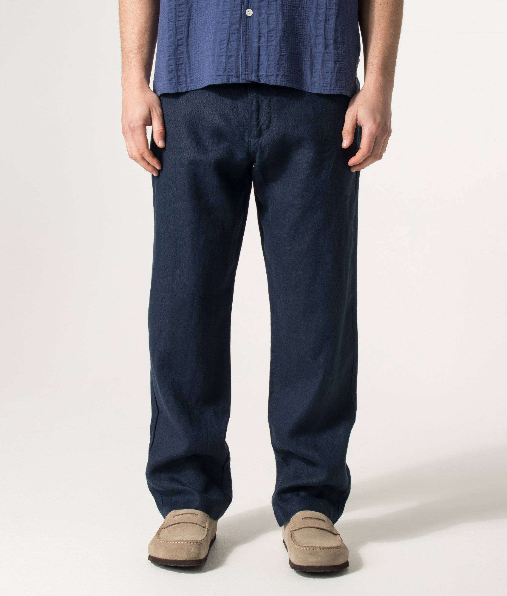 NN.07 Regular Fit Straight Leg Aden Chinos in Navy Blue at EQVVS Menswear. Model front shot.