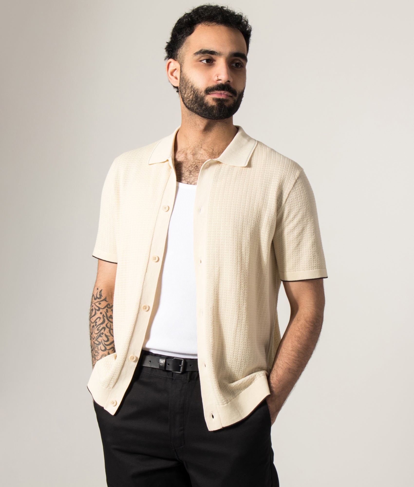 NN.07 Nalo Knit Textured Stitch Polo Shirt in Ivory at EQVVS Menswear. Model front shot.