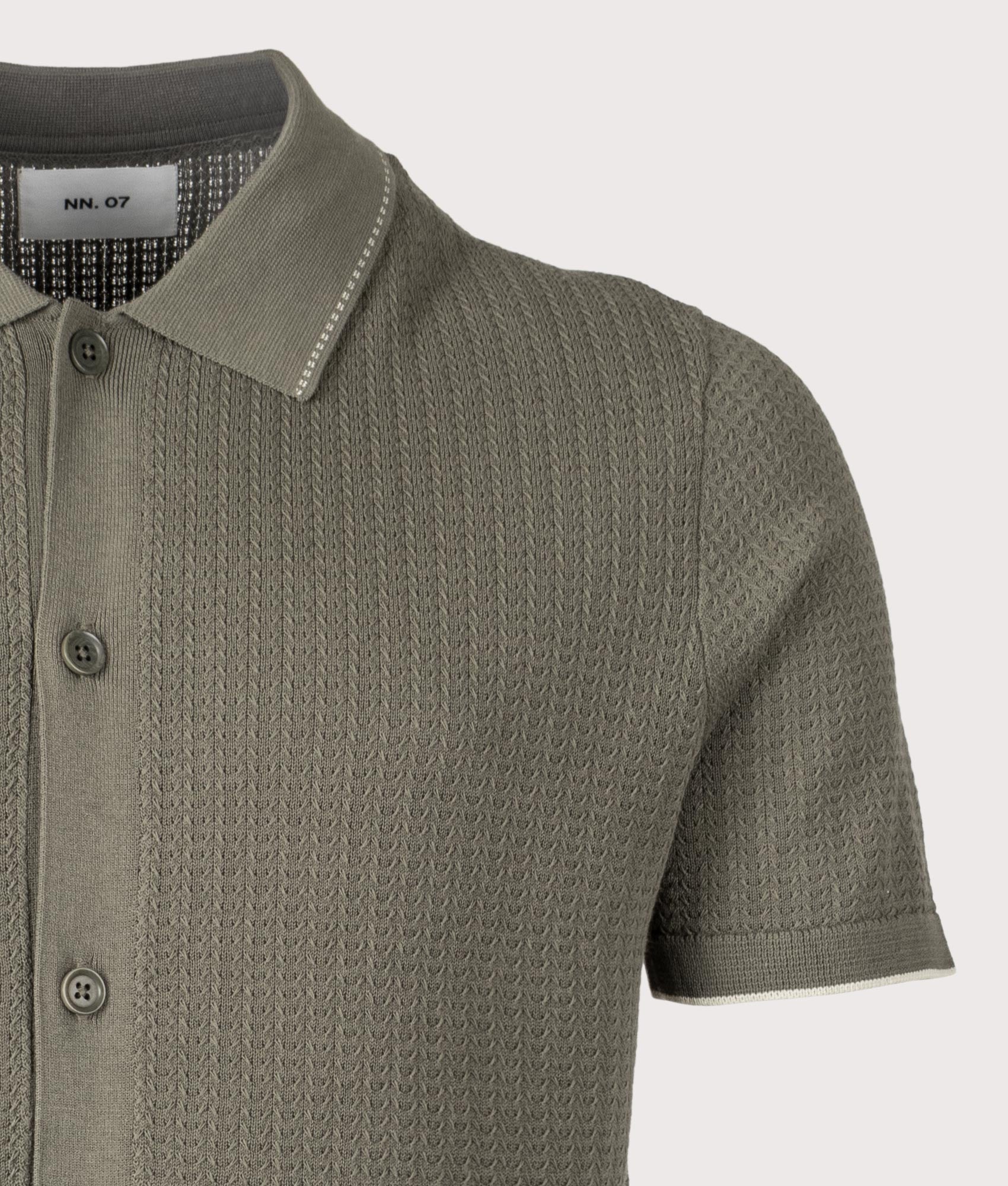 NN.07 Nalo Knit Textured Stitch Polo Shirt in Capers at EQVVS Menswear. Detail shot.