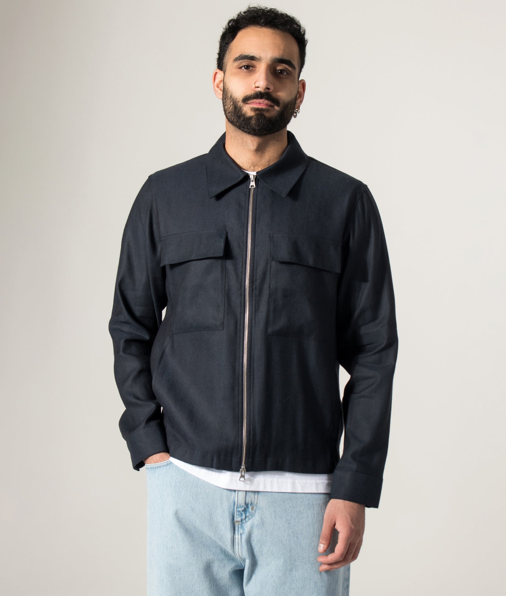 NN.07 Alban Jacket in Deep Navy at EQVVS Menswear. Model front shot.