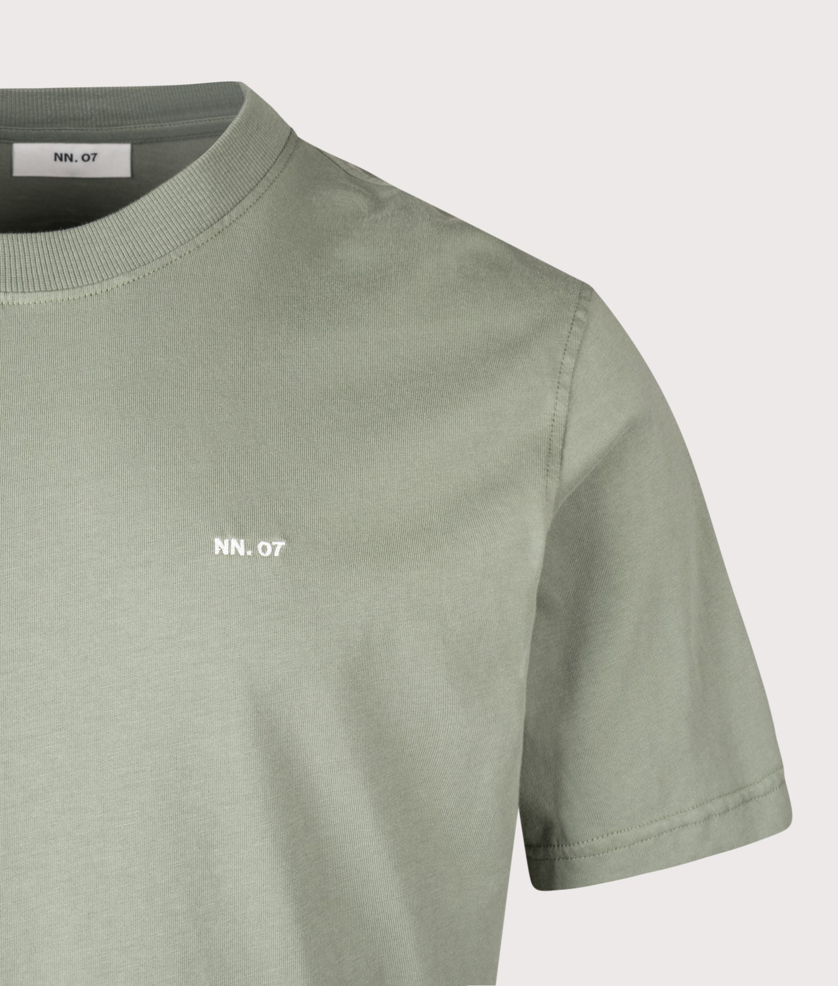 NN.07 Adam EMB T-Shirt in Sea Spray at EQVVS Menswear. Detail shot.
