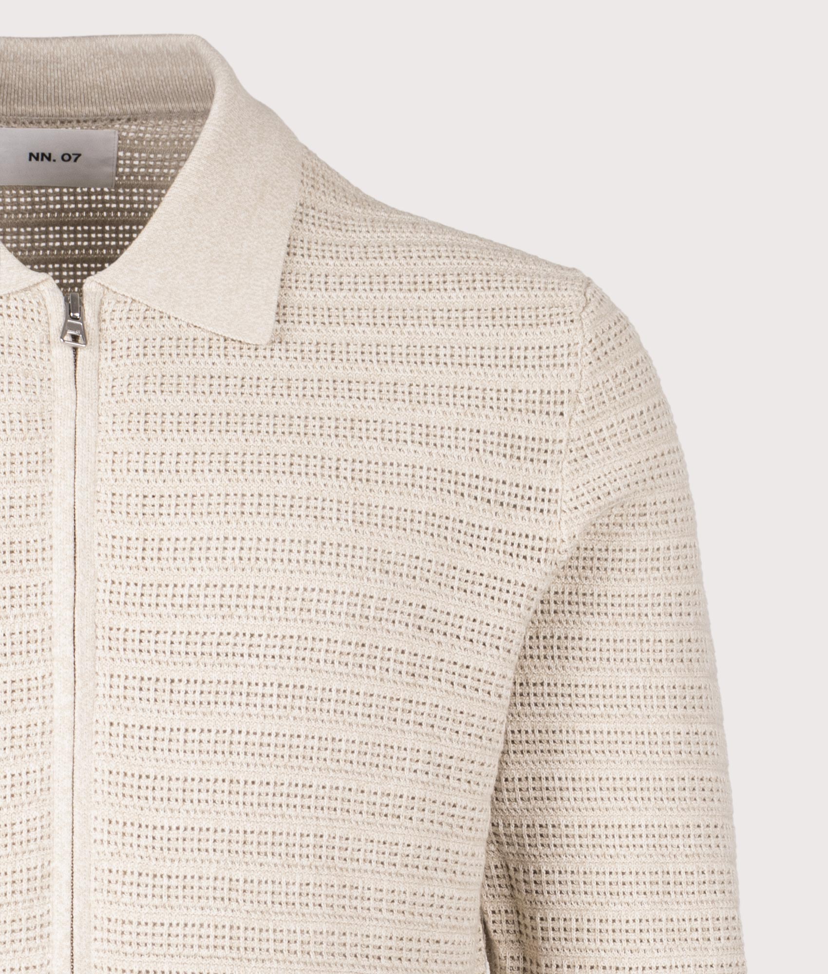 NN.07 Gustav Zip Through Knit Cardigan in Ivory Mouliné at EQVVS Menswear. Detail shot.