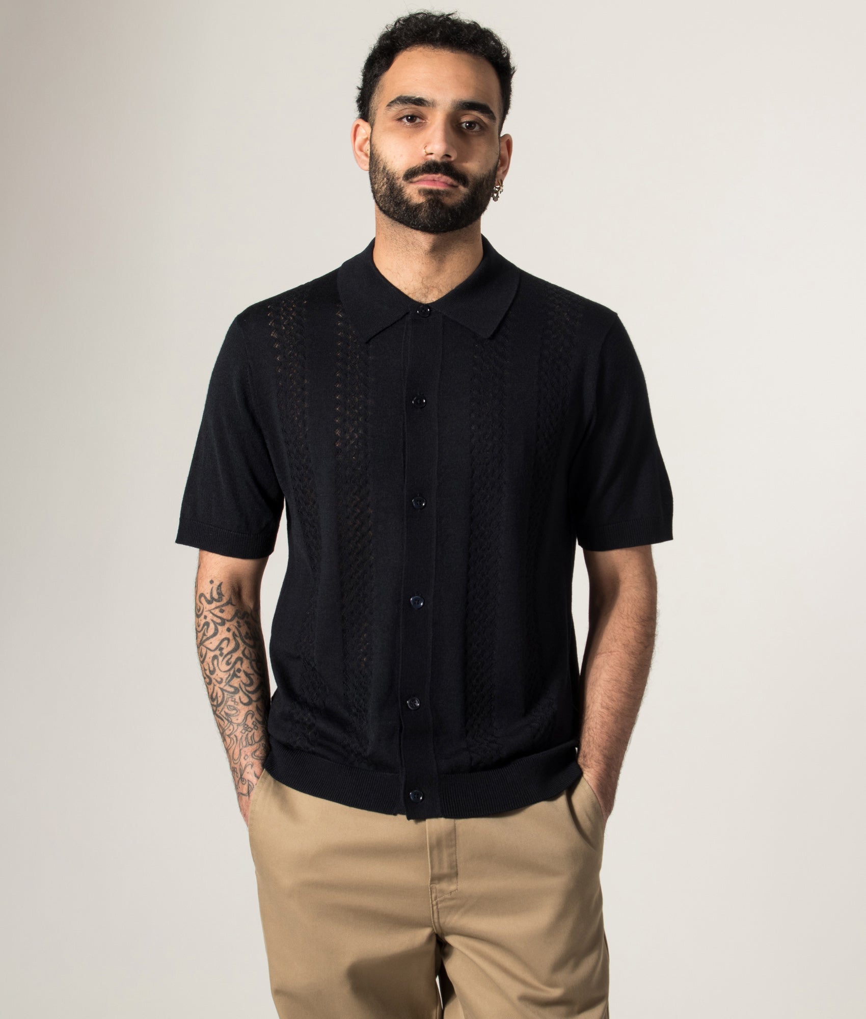 NN.07 Thor Knitted Polo shirt in Deep Navy at EQVVS Menswear. Model front shot.