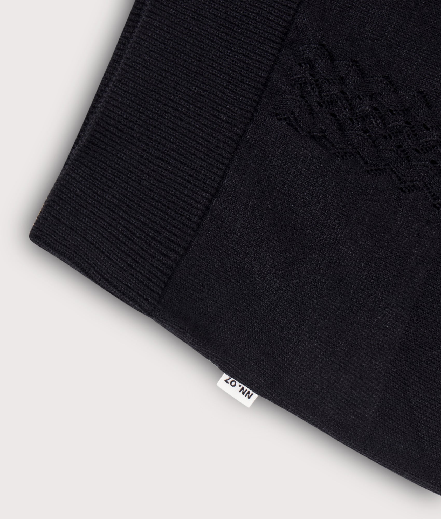 Thor Knitted Polo shirt in Deep Navy by NN.07. Shot by EQVVS. Detail shot.