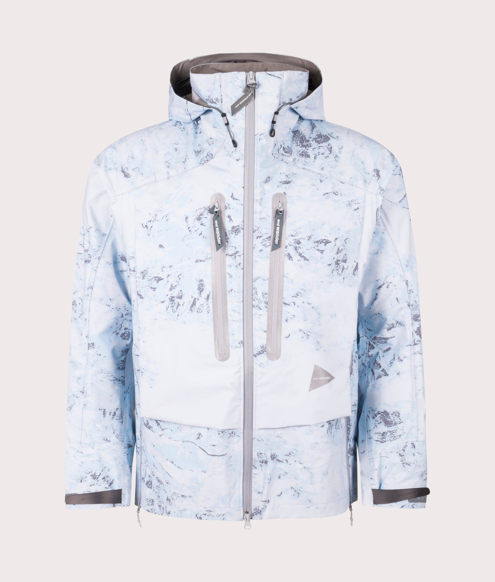 Pertex Shield Rain Jacket in Light Blue by And Wander at EQVVS Menswear. Front Shot.