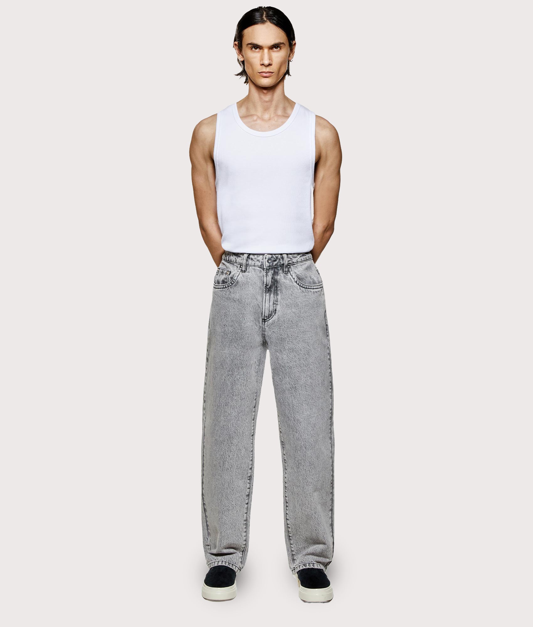 MKI MIYUKI ZOKU Denim Classic Jeans in Washed Black at EQVVS Menswear. Model full front shot.