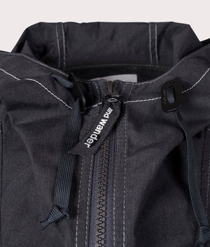 and wander Tough Aramid Hoodie in Charcoal at EQVVS. Zip Detail Shot.