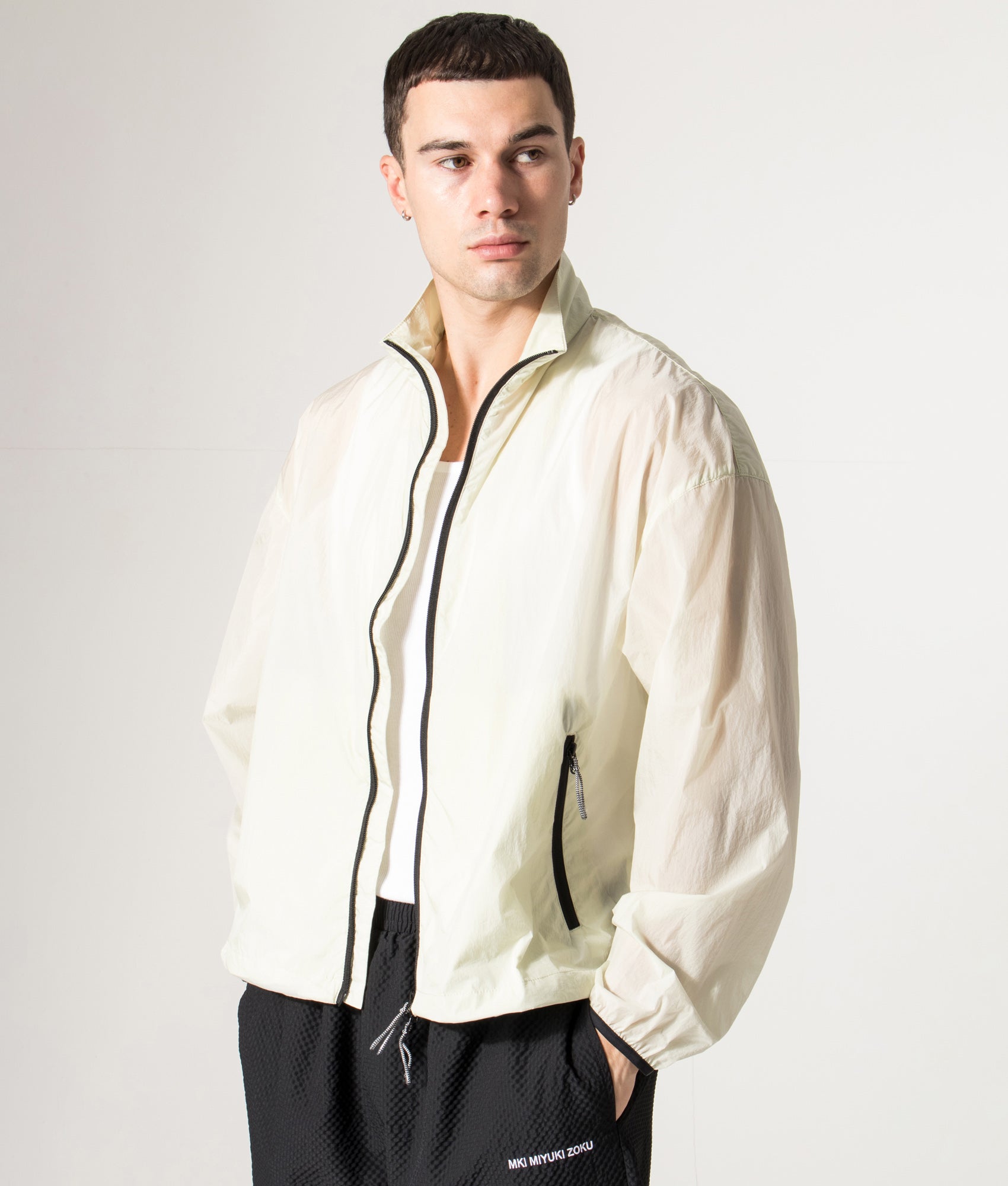 Active Nylon Track Jacket in Mint | MKI MIYUKI ZOKU | Shot at EQVVS | Front model shot 