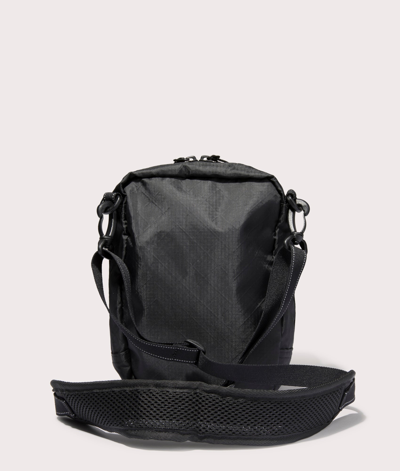 and wander 107  Ecopak Shoulder Pouch in Black at EQVVS. Back Shot.