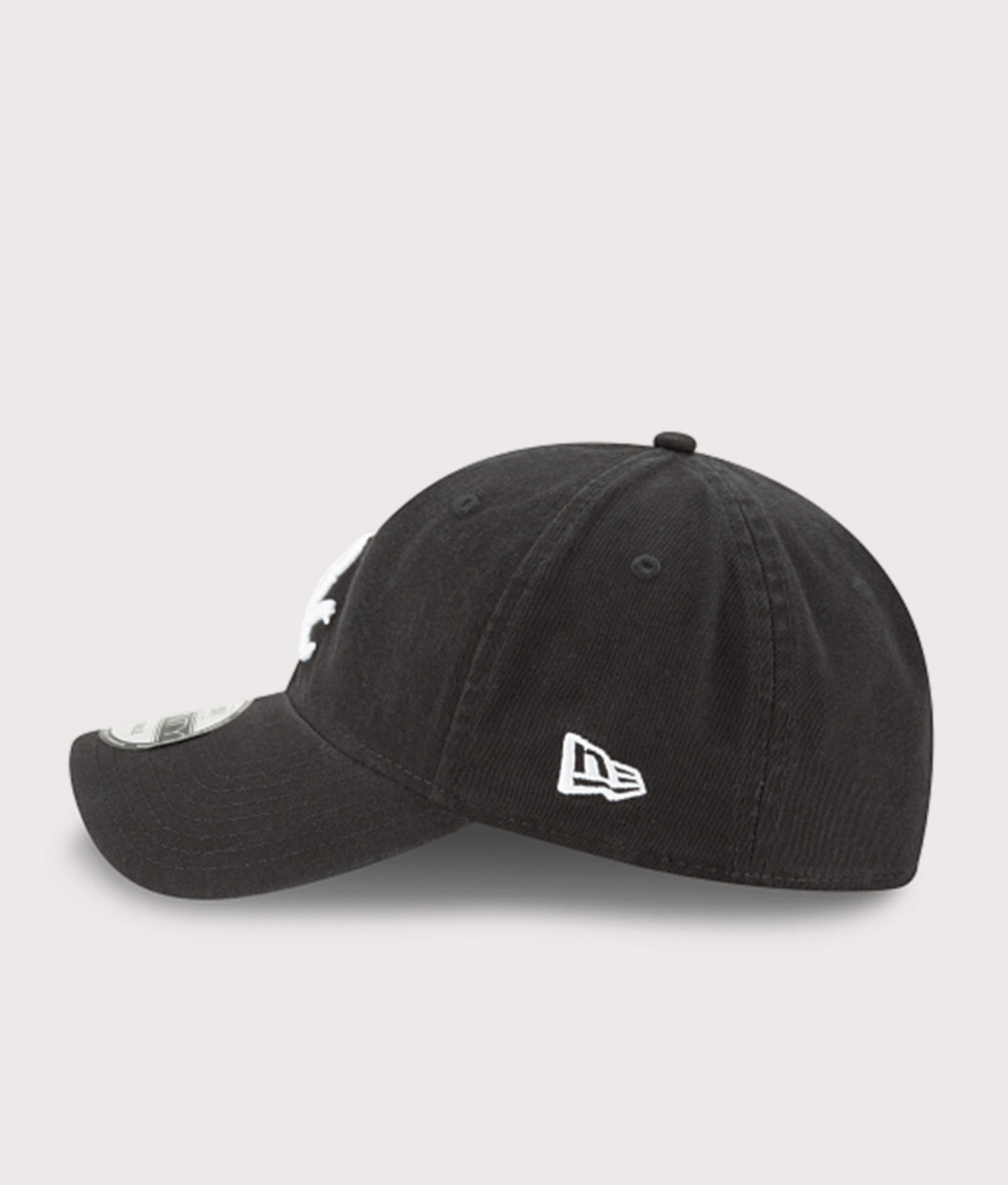 New Era MLB Core Classic Washed 9TWENTY Adjustable Cap in Black at EQVVS Menswear. Side shot.