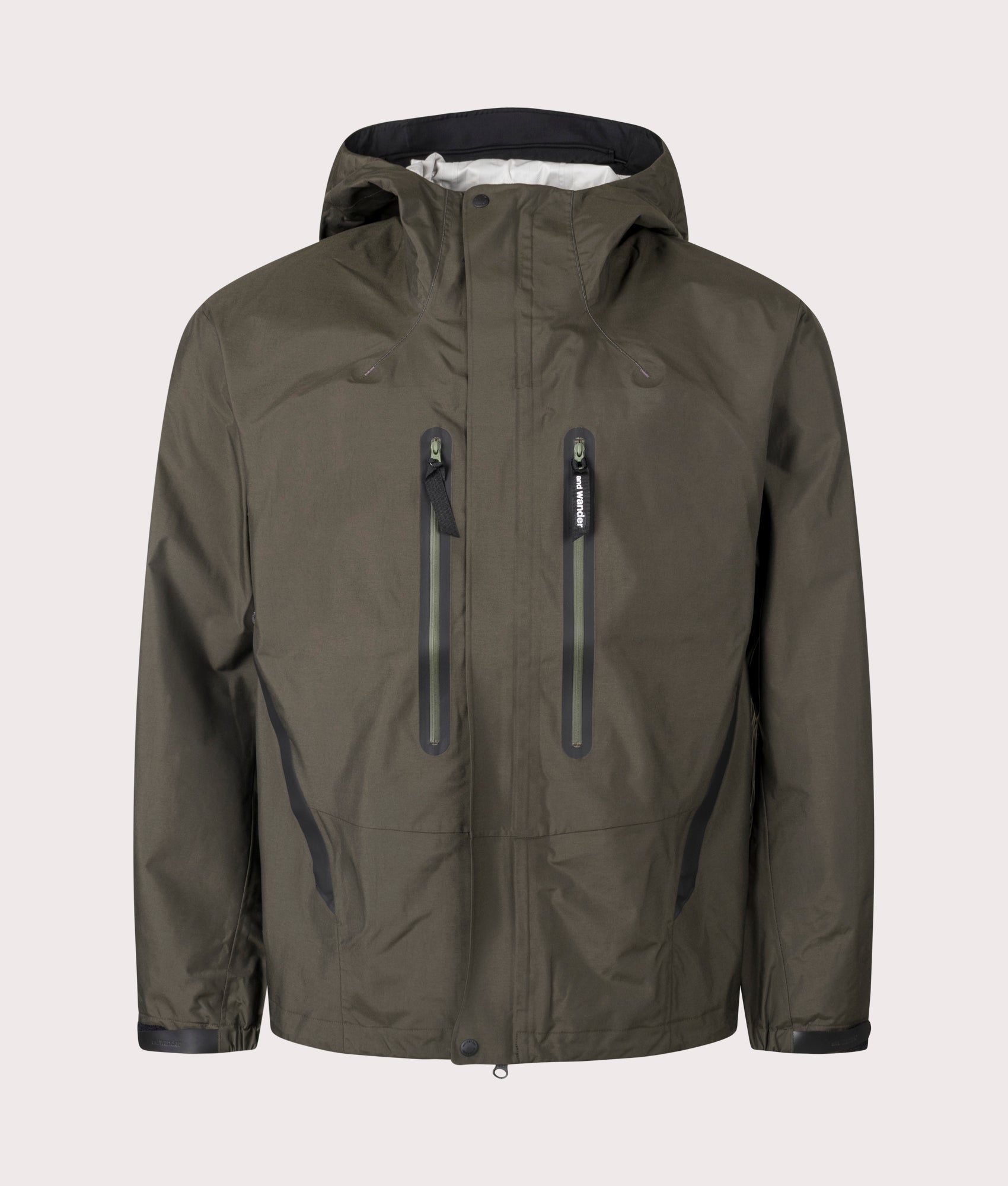 and wander 2.5L Hiker Rain Jacket in Dark Khaki. Shot at EQVVS. Front detail shot 