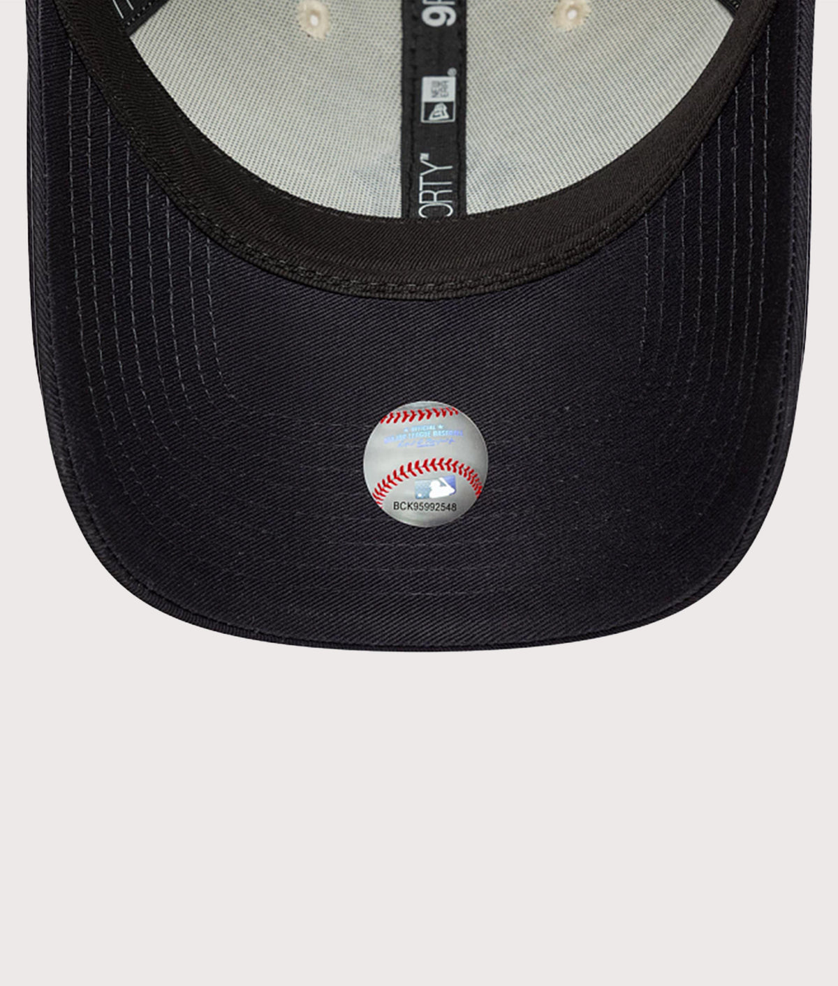 New Era New York Yankees MLB World Series Patch 9FORTY Adjustable Cap in  Cream and Navy at EQVVS Menswear. Peak shot.