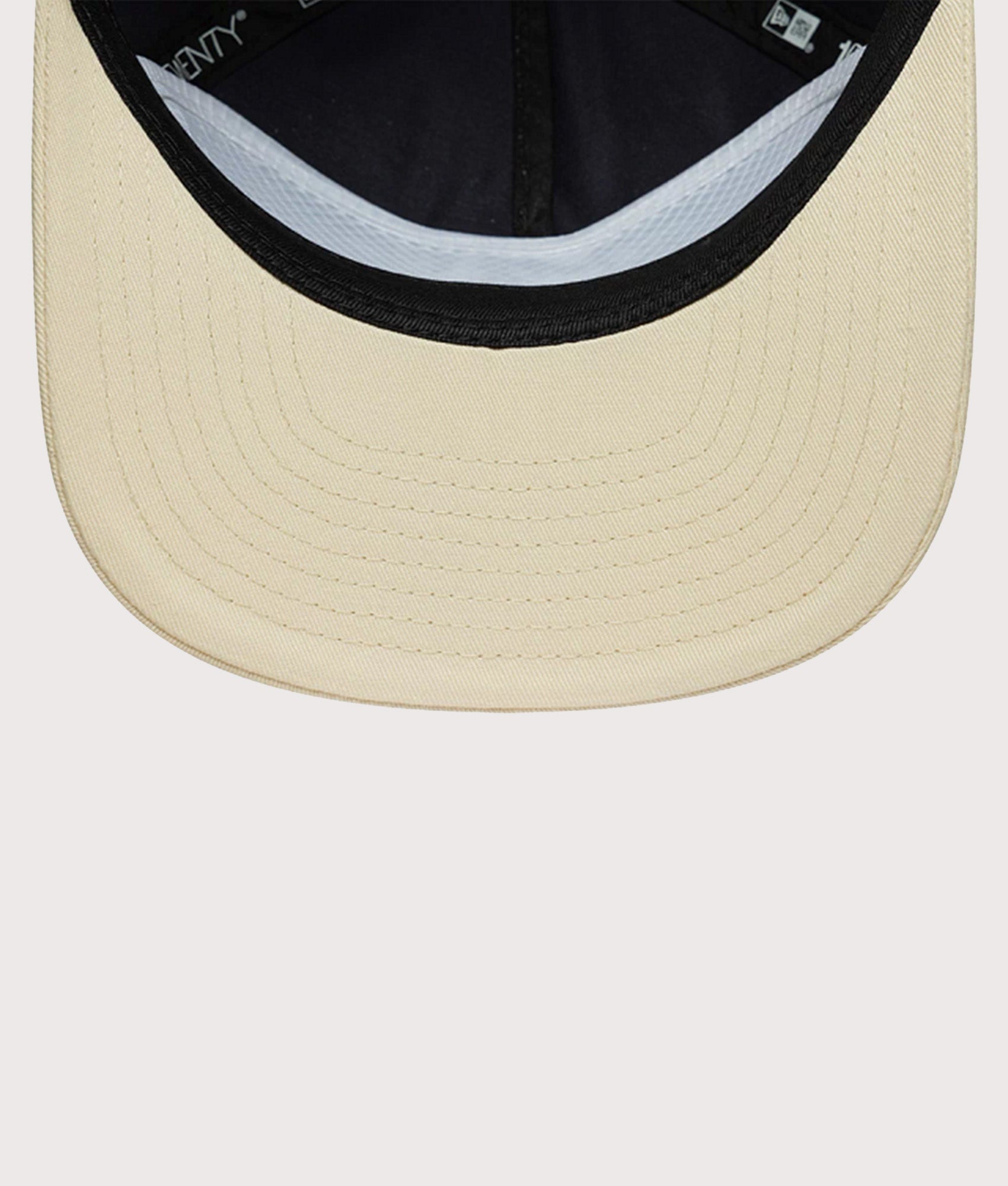 New Era New Era Washed Graphic 19TWENTY Adjustable Cap in Navy and Cream at EQVVS Menswear. Peak shot.