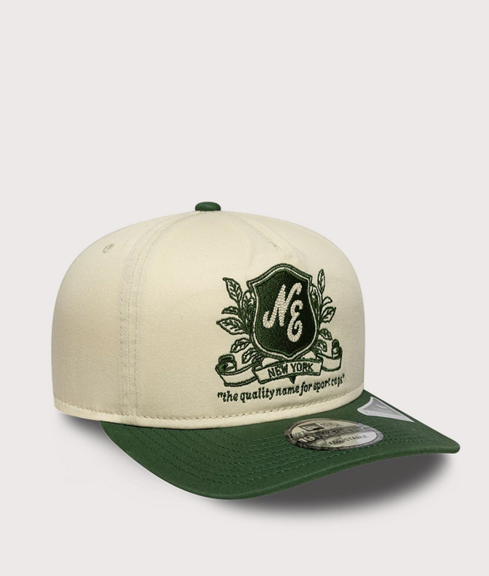 New Era New Era Washed Graphic 19TWENTY Adjustable Cap in Cream and green at EQVVS Menswear. Angled front shot.