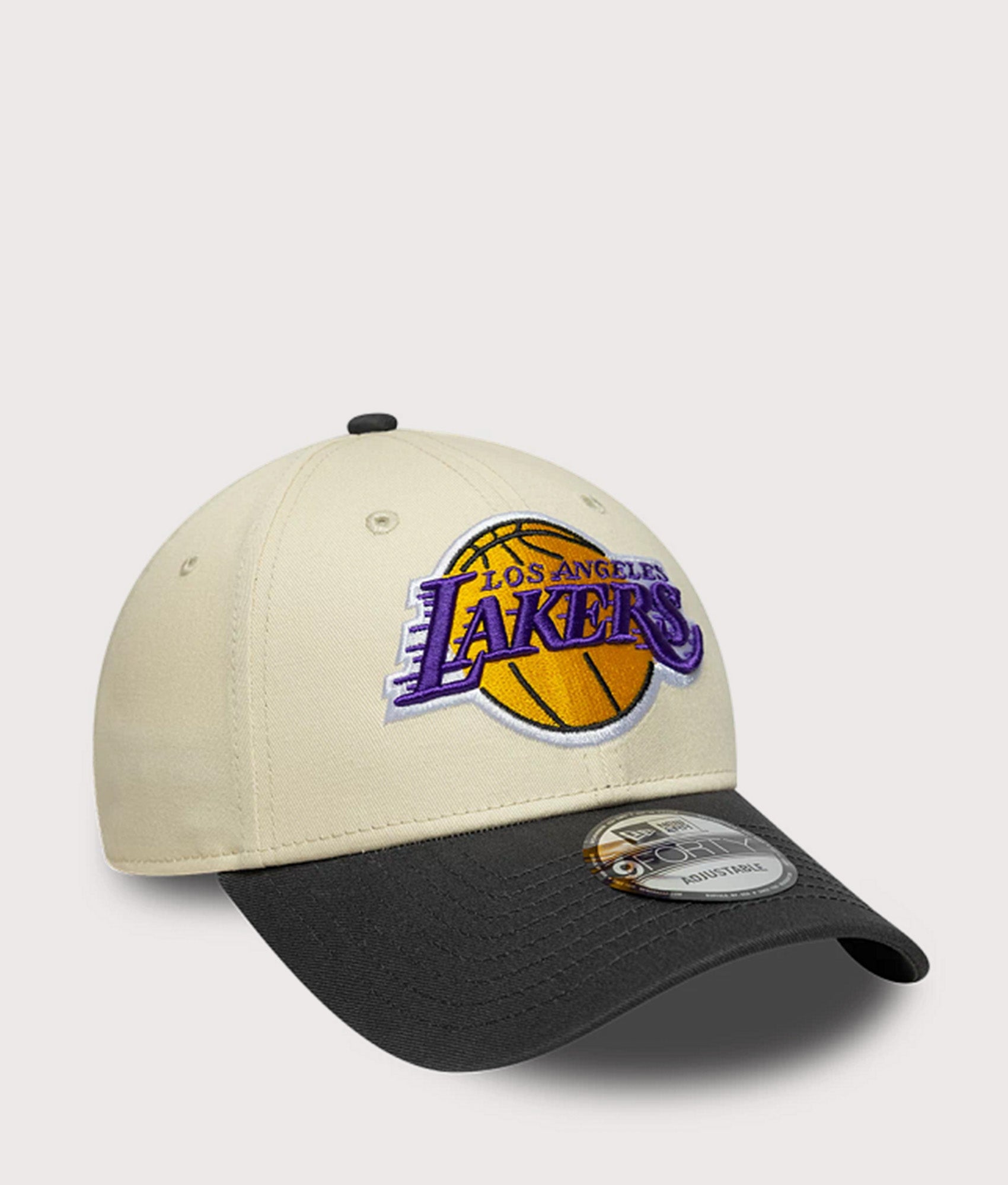 New Era LA Lakers NBA Colour Block 9FORTY Adjustable Cap in Cream and Black at EQVVS Menswear. Angled front shot.