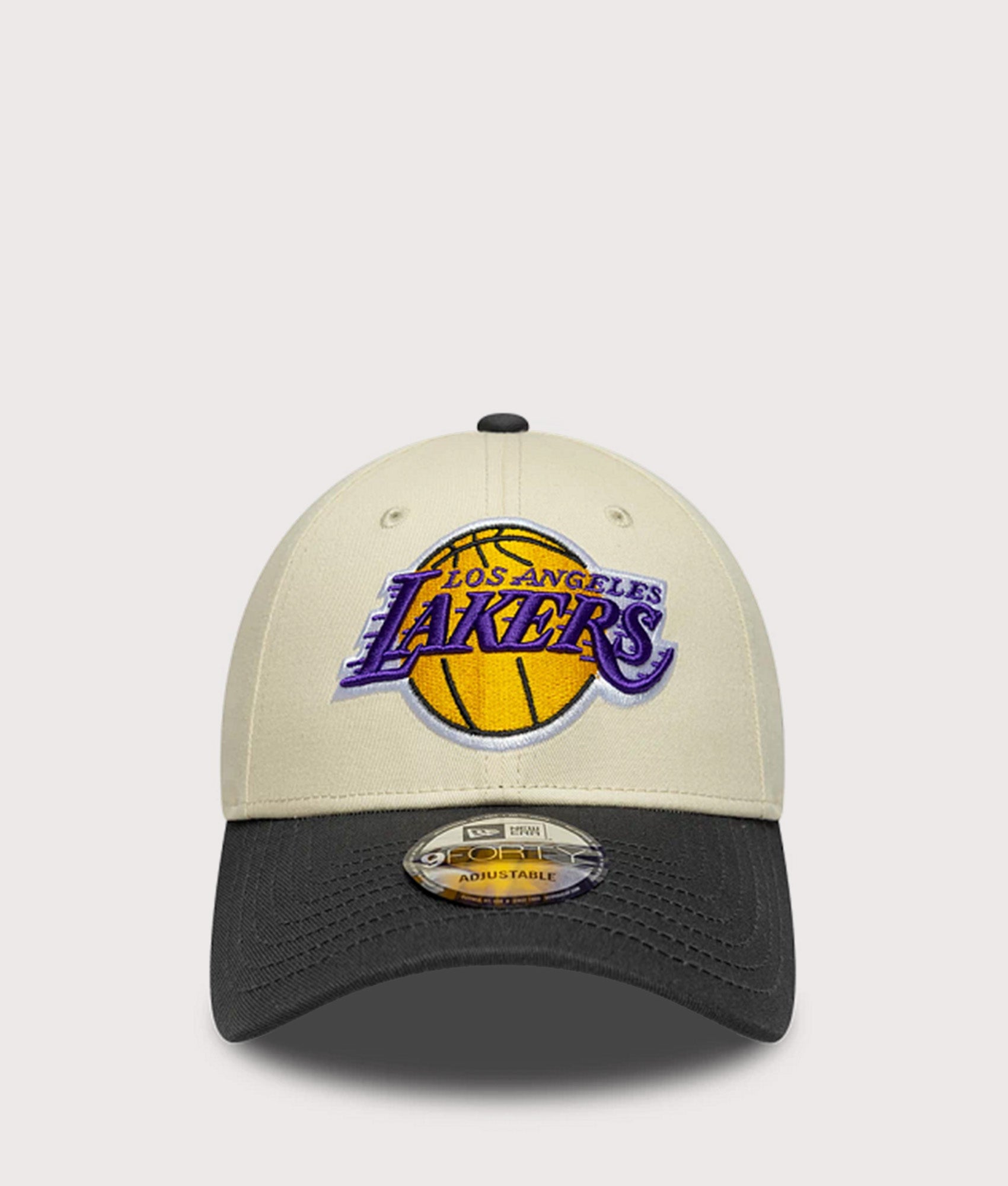 New Era LA Lakers NBA Colour Block 9FORTY Adjustable Cap in Cream and Black at EQVVS Menswear. Front shot.