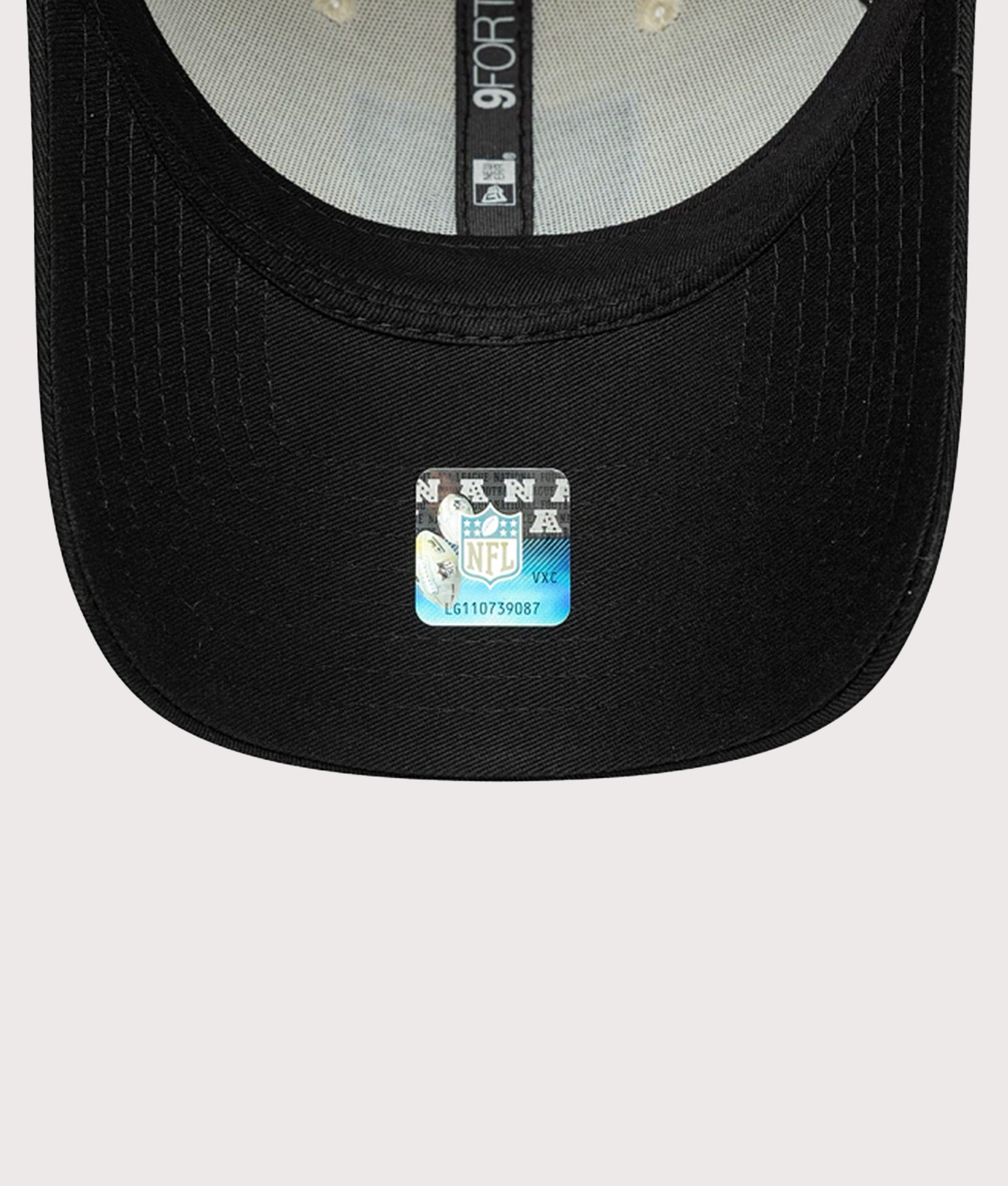 New Era Las Vegas Raiders NFL Colour Block 9FORTY Adjustable Cap in Cream and Black at EQVVS Menswear. Front shot.