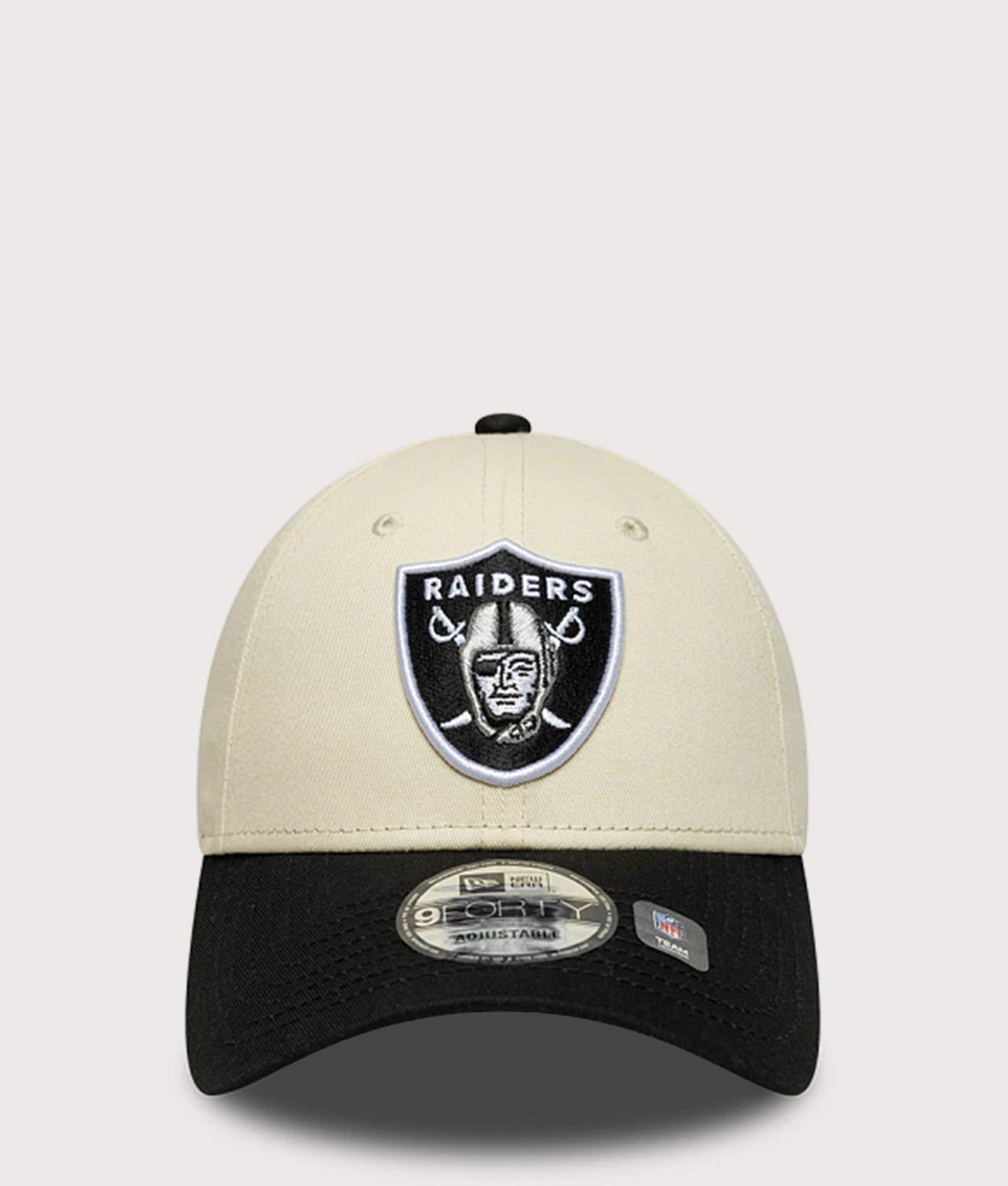 New Era Las Vegas Raiders NFL Colour Block 9FORTY Adjustable Cap in Cream and Black at EQVVS Menswear. Front shot.